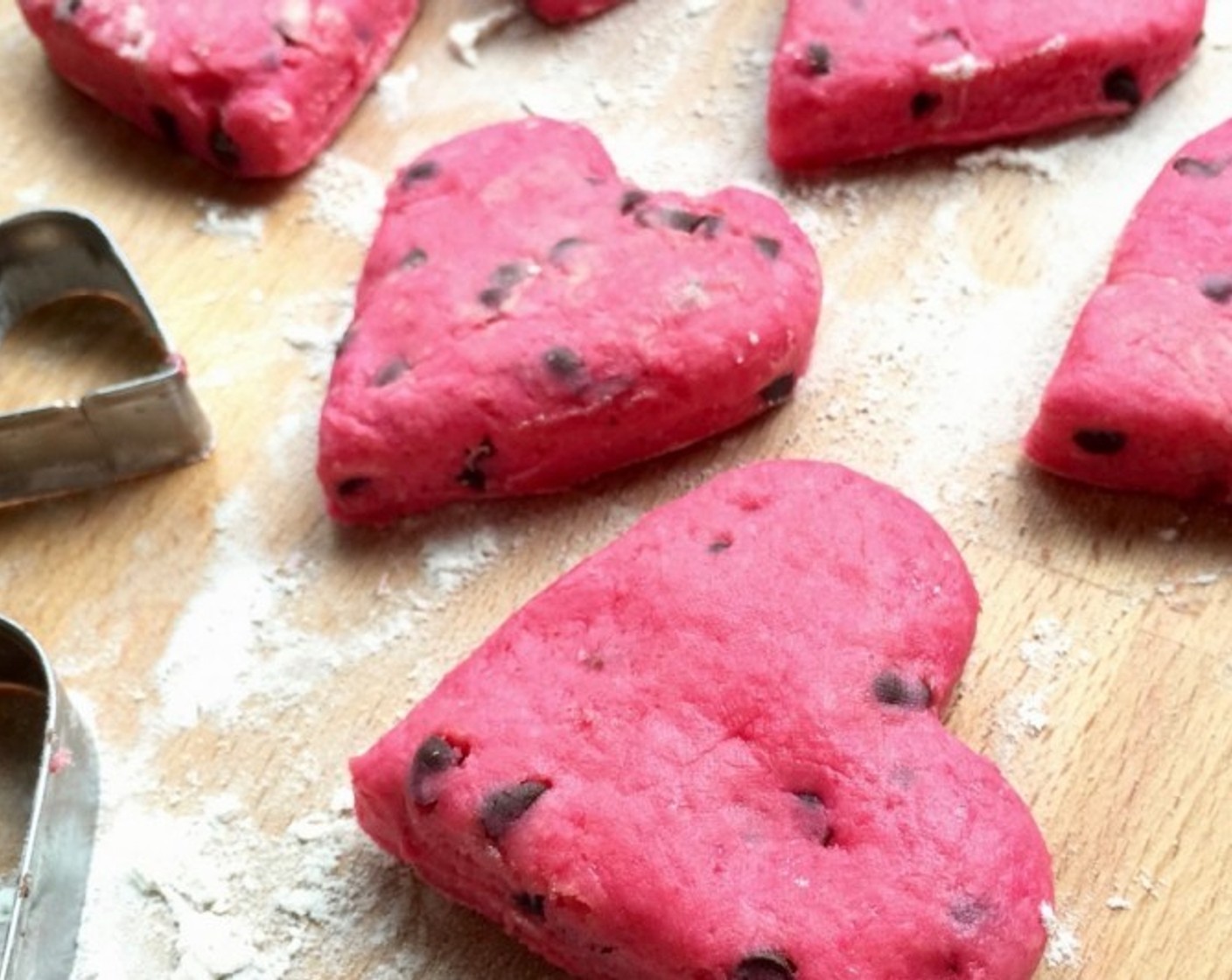 step 11 Cut out heart shapes with a heart-shaped cookie cutter. Gather scraps and cut out additional heart shapes.