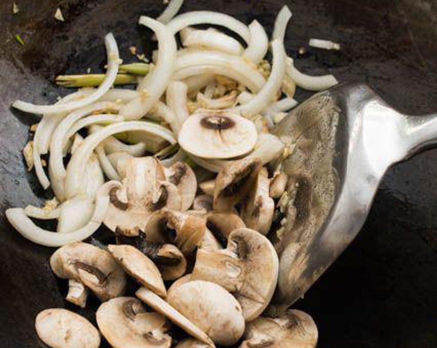 step 6 Add Mushroom (1 cup) to the wok, then stir-fry till cooked all the way through.