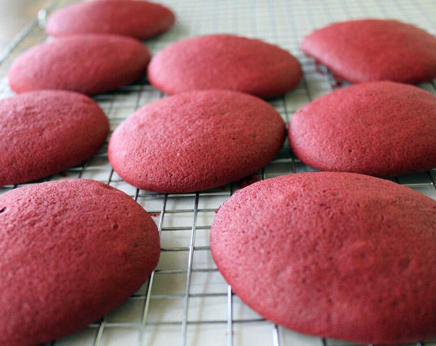 step 6 Remove from the oven and let cool for 5 minutes. Transfer to a wire rack and cool completely. Repeat the process until all of the batter has been used. Use a new sheet of parchment paper with each batch.