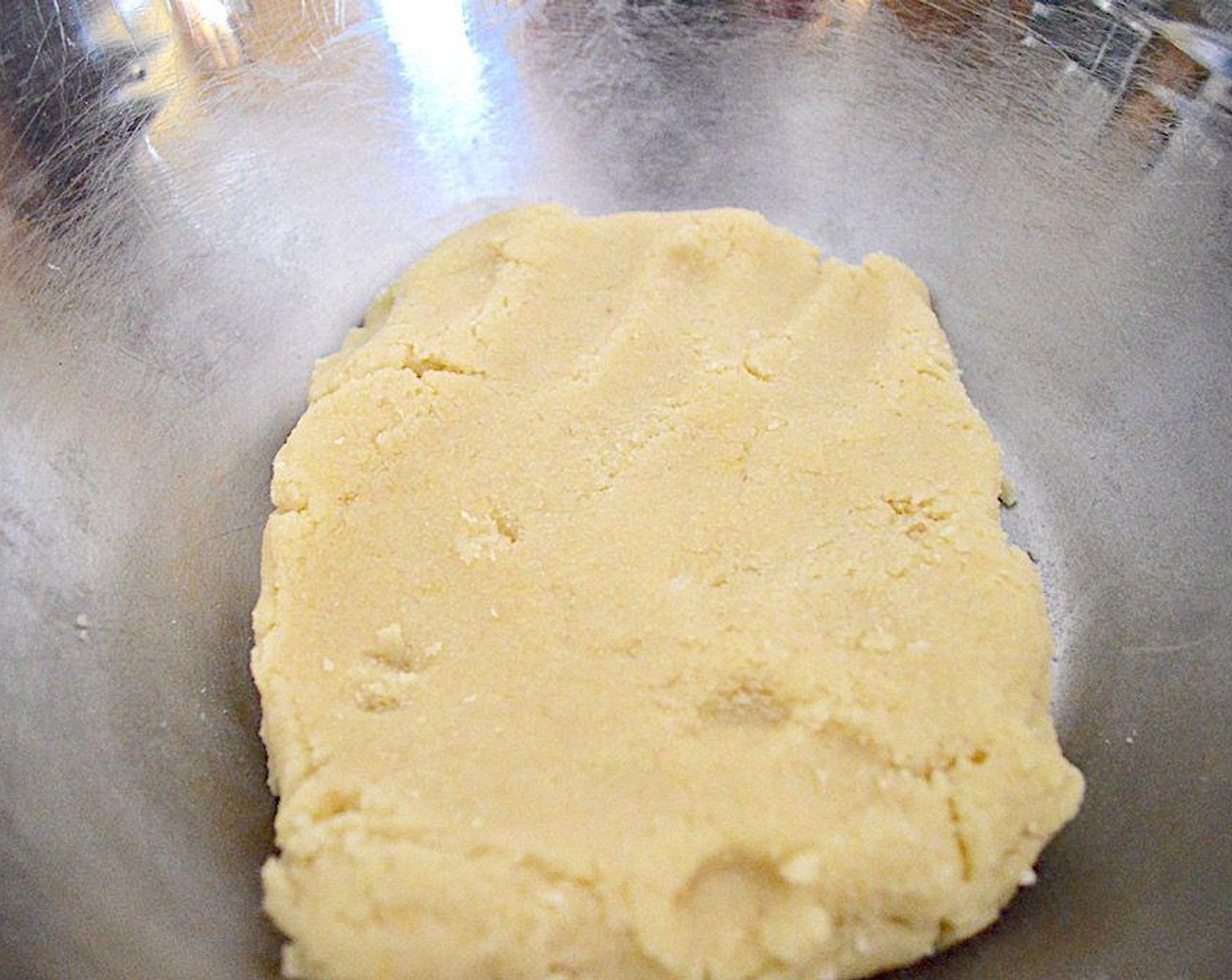 step 7 Whisk the Almond Flour (2 cups), Powdered Confectioners Sugar (1 cup), and Granulated Sugar (1 cup) together in a large mixing bowl. Add the Eggland's Best Classic Egg (1) and Almond Extract (1 tsp) and stir it all together until it starts to all bind together in almost a dough. Bring it together with clean hands and knead it for a few minutes to make sure it is smooth and uniform.
