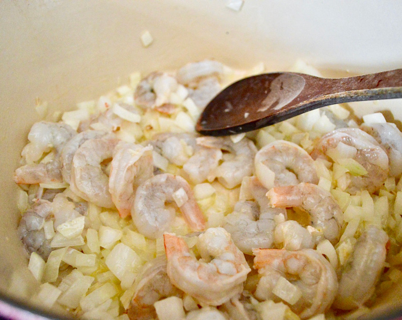step 3 Add in Shrimp (1 lb) and cook until it becomes pink for another couple of minutes.