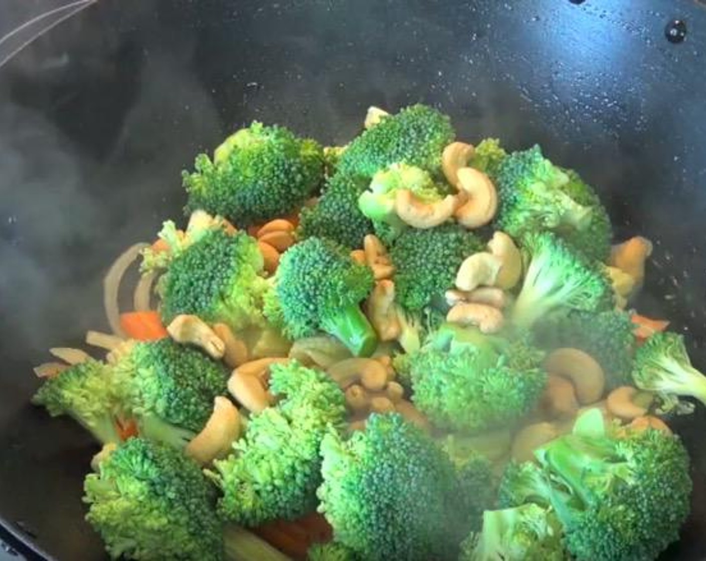 step 5 Add Garlic (2 cloves), Baby Corn (1/2 cup), Broccoli Florets (2 3/4 cups) and Unsalted Cashews (1/2 cup). Stir fry for 2-3 minutes, or until vegetables are tender.