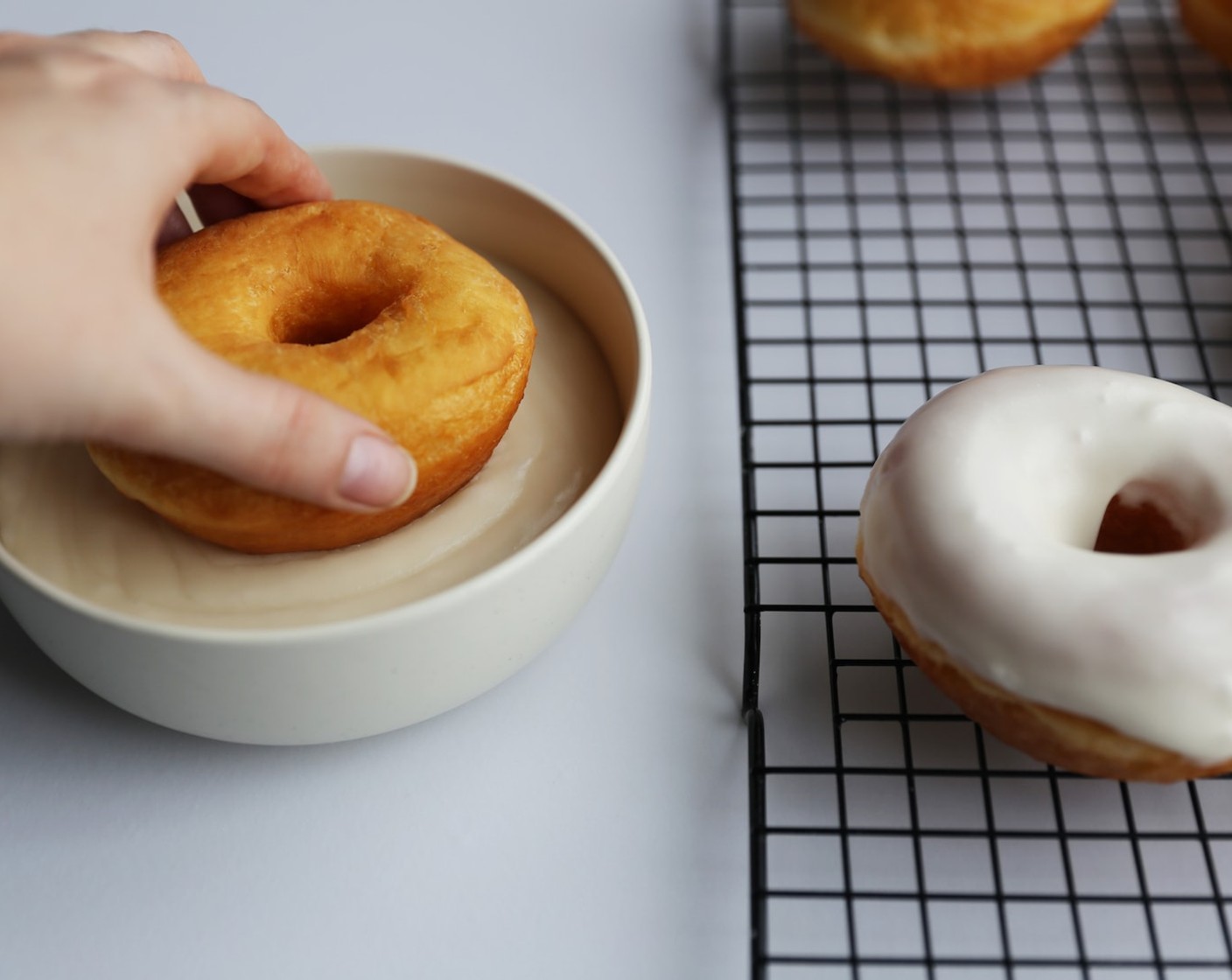 step 19 Begin dipping each doughnut into the glaze and gently swirl.