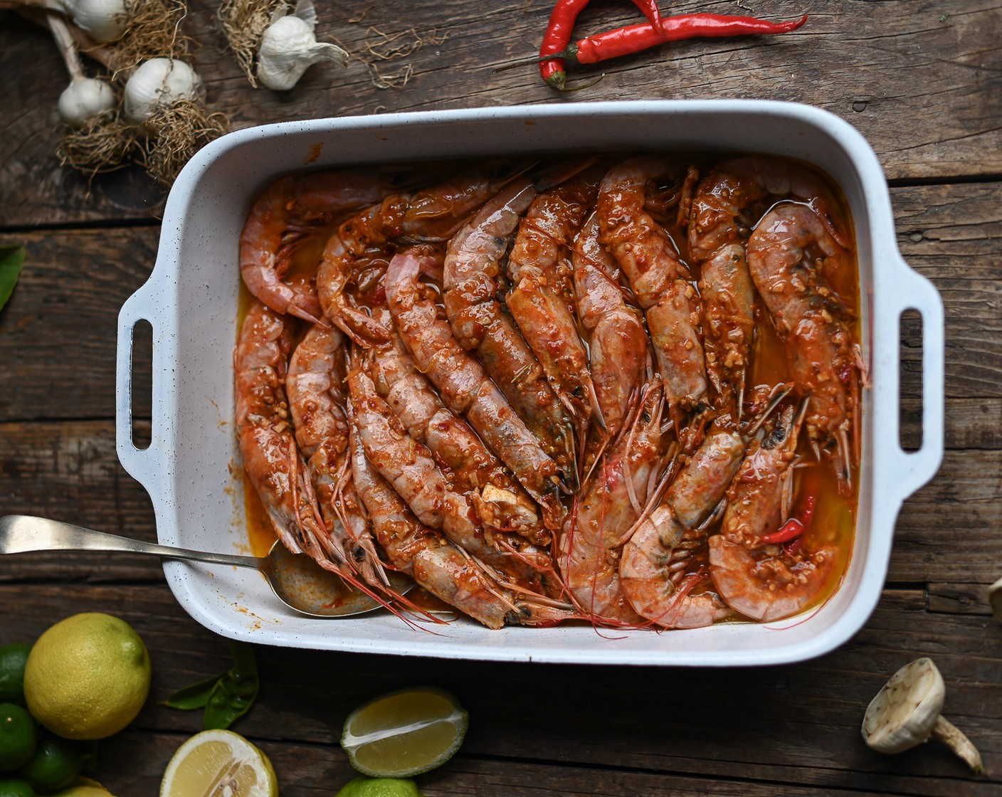 step 4 Arrange the cleaned prawns in a large ovenproof dish and pour over the paprika butter.  If cooking the prawns in the oven, place them in the dish under a hot 425 degrees F (220 degrees C) grill for 2-3 minutes per side.