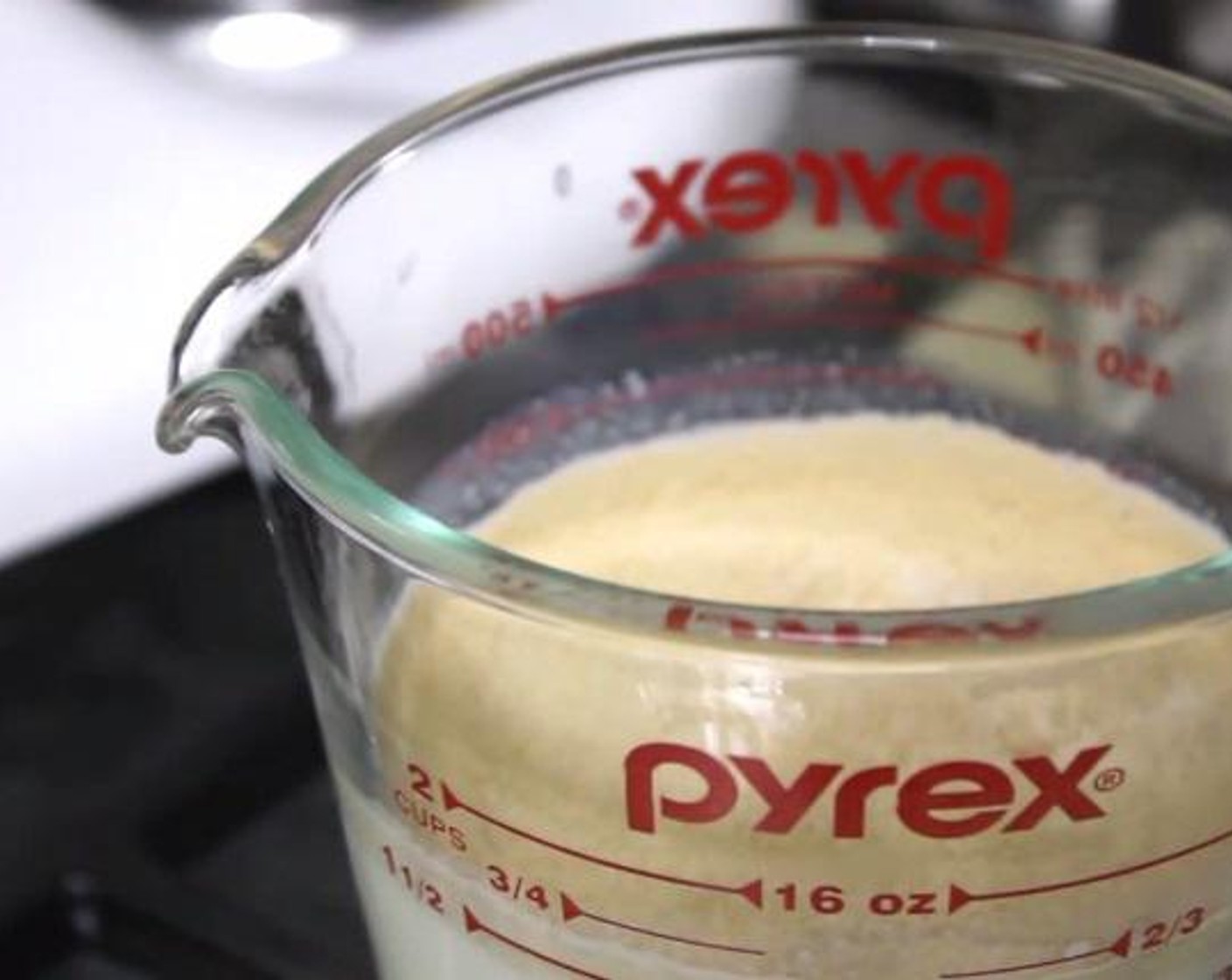 step 2 Sprinkle the Instant Dry Yeast (1/2 tsp) and Granulated Sugar (1 tsp) over the Whole Milk (4 Tbsp), and mix everything together. Let the mixture sit for 5 minutes.