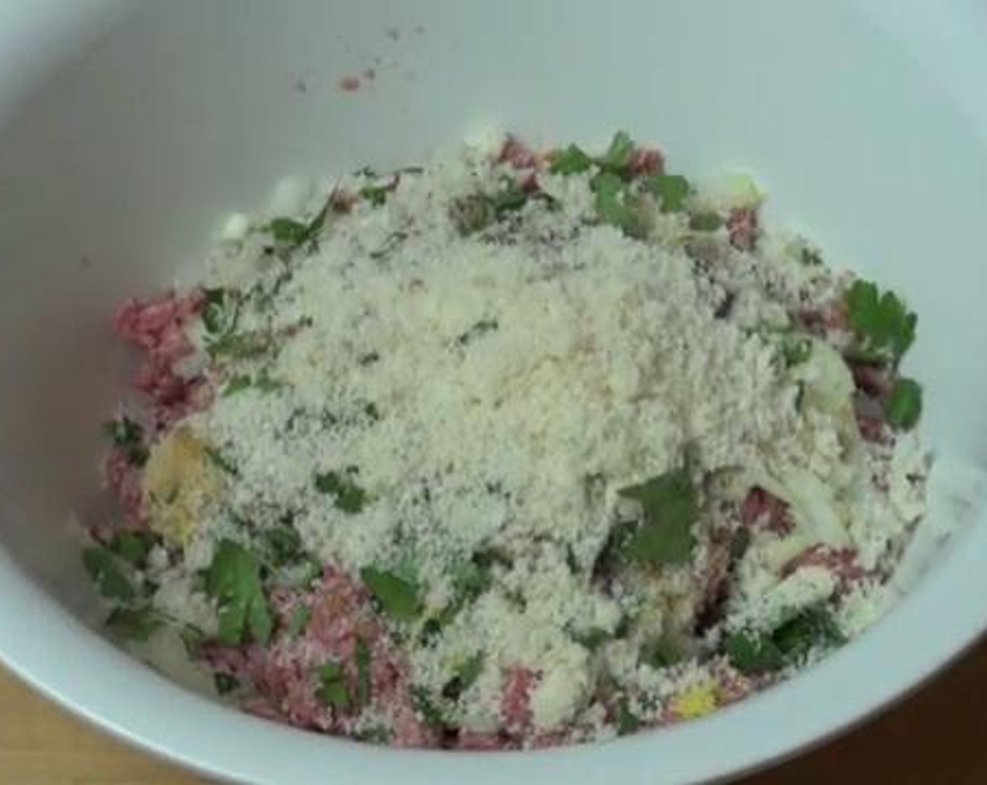 step 1 In a mixing bowl, mix the Ground Lamb (2.2 lb), Yellow Onion (1), Garlic (1 clove), Fresh Parsley (to taste), Ground Cumin (1/2 Tbsp), Ground Allspice (1 tsp), zest from Lemon (1/8), Breadcrumbs (1/2 cup), and Egg (1).