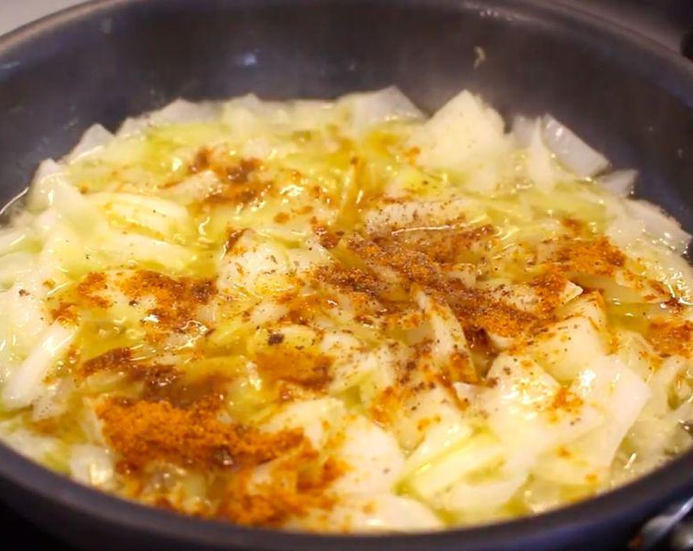 step 2 Add Onion (1), Mild Curry Powder (2 Tbsp), Ground Cardamom (1 tsp), Tandoori Paste (3 Tbsp), Tomato Paste (1 cup), and Garam Masala (2 tsp). Cook for 2 minutes.