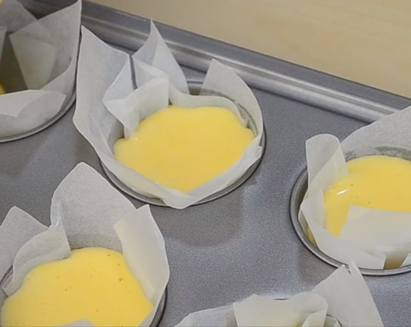 step 8 Pour the combined batter into the lined muffin pan till 3/4 full. Next, bake in the preheated oven for about 20 to 25 minutes until a toothpick inserted in the middle comes out clean.