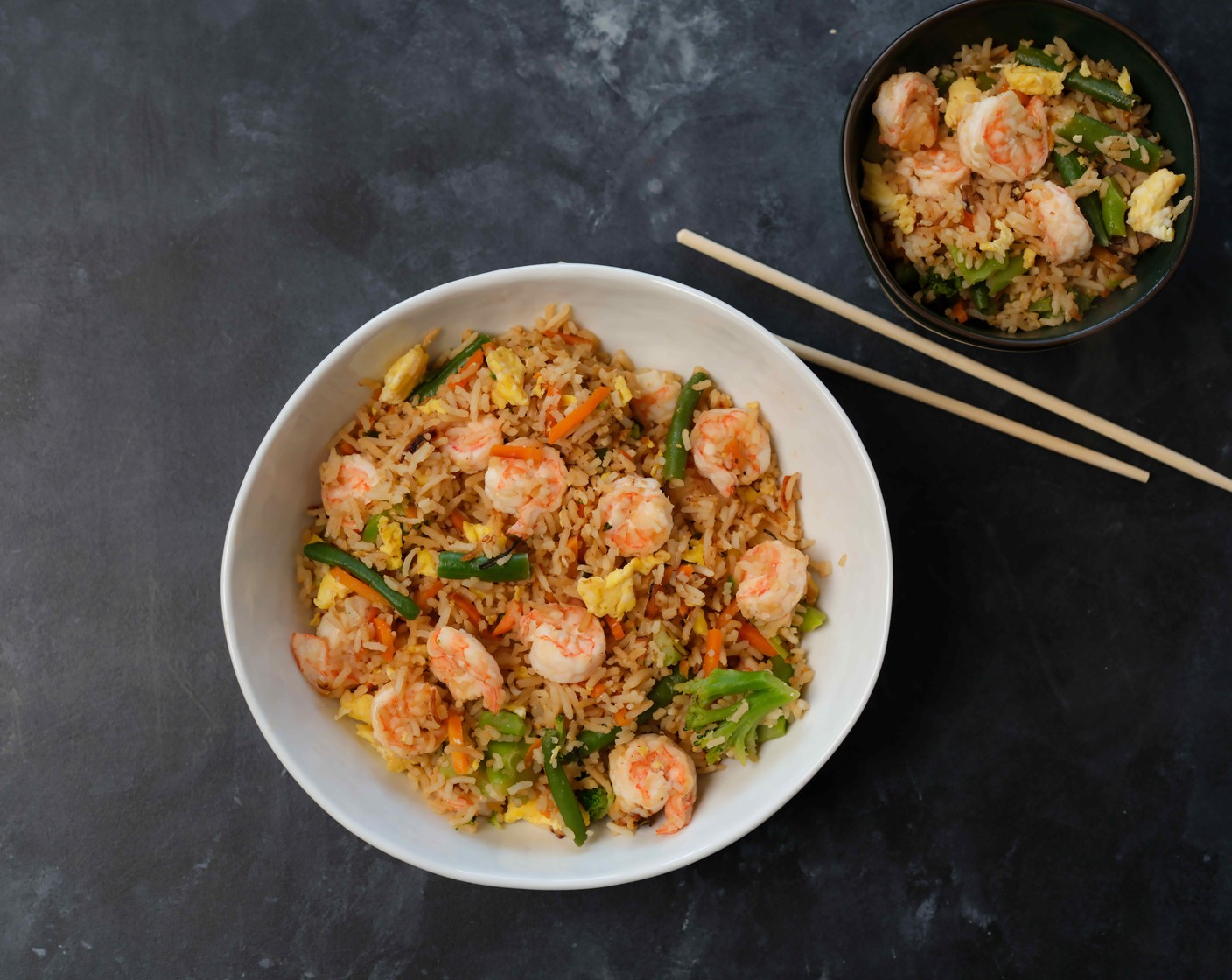 step 6 Remove the pan from the heat and stir in the eggs and shrimp. Sprinkle with the reserved scallion greens, a dash of Sesame Oil (to taste), and some Oyster Sauce (to taste) and/or Soy Sauce (2 Tbsp) to your liking.