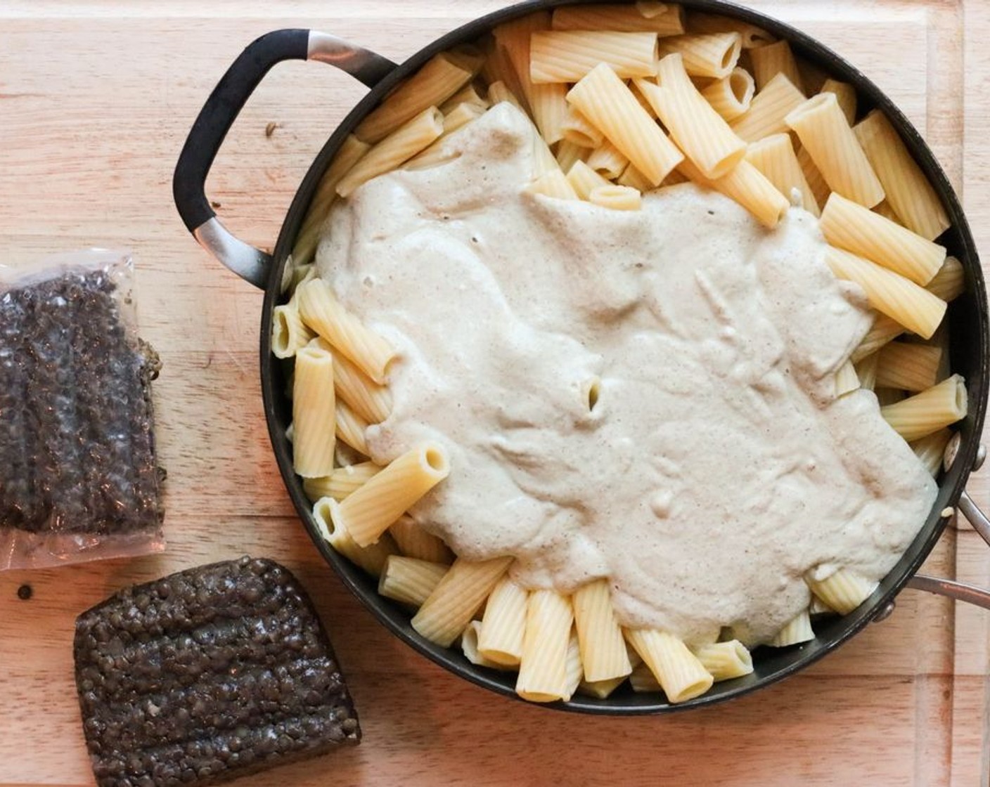 step 5 Pour sauce over the warm Rigatoni (1 lb) and sprinkle with Fresh Oregano (4 Tbsp).