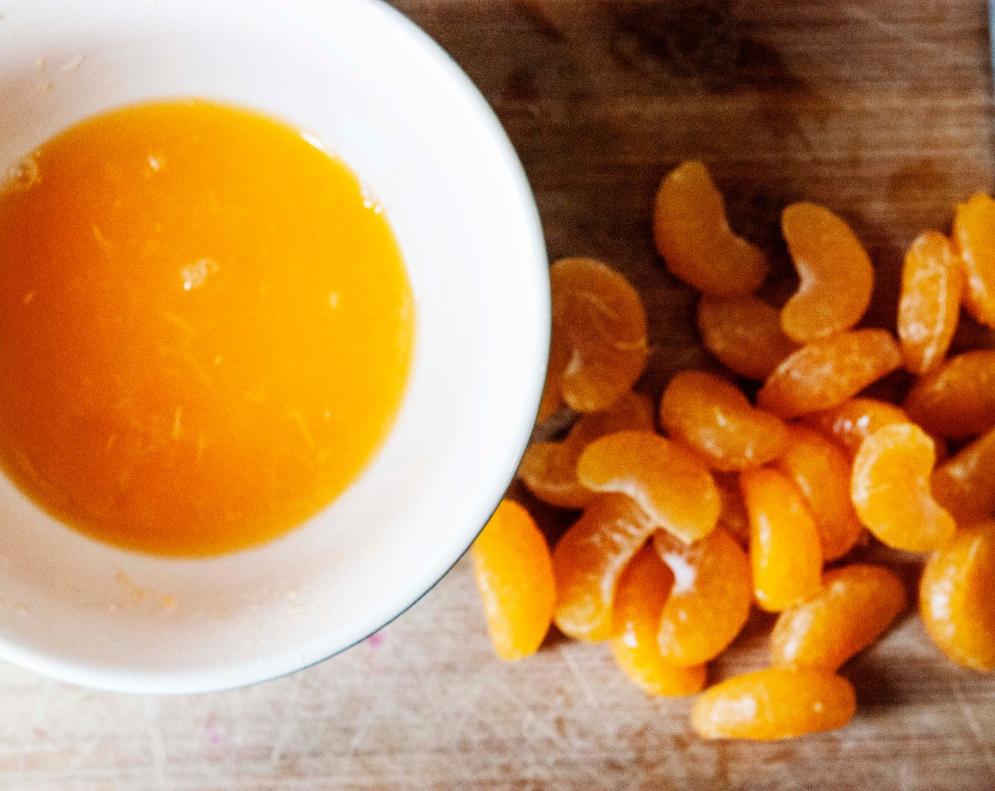 step 4 In a separate bowl collect 1/4 cup plus 2/3 cup of Clementine Juice (10) and segment the remaining clementines. Set the 1/2 cup aside.