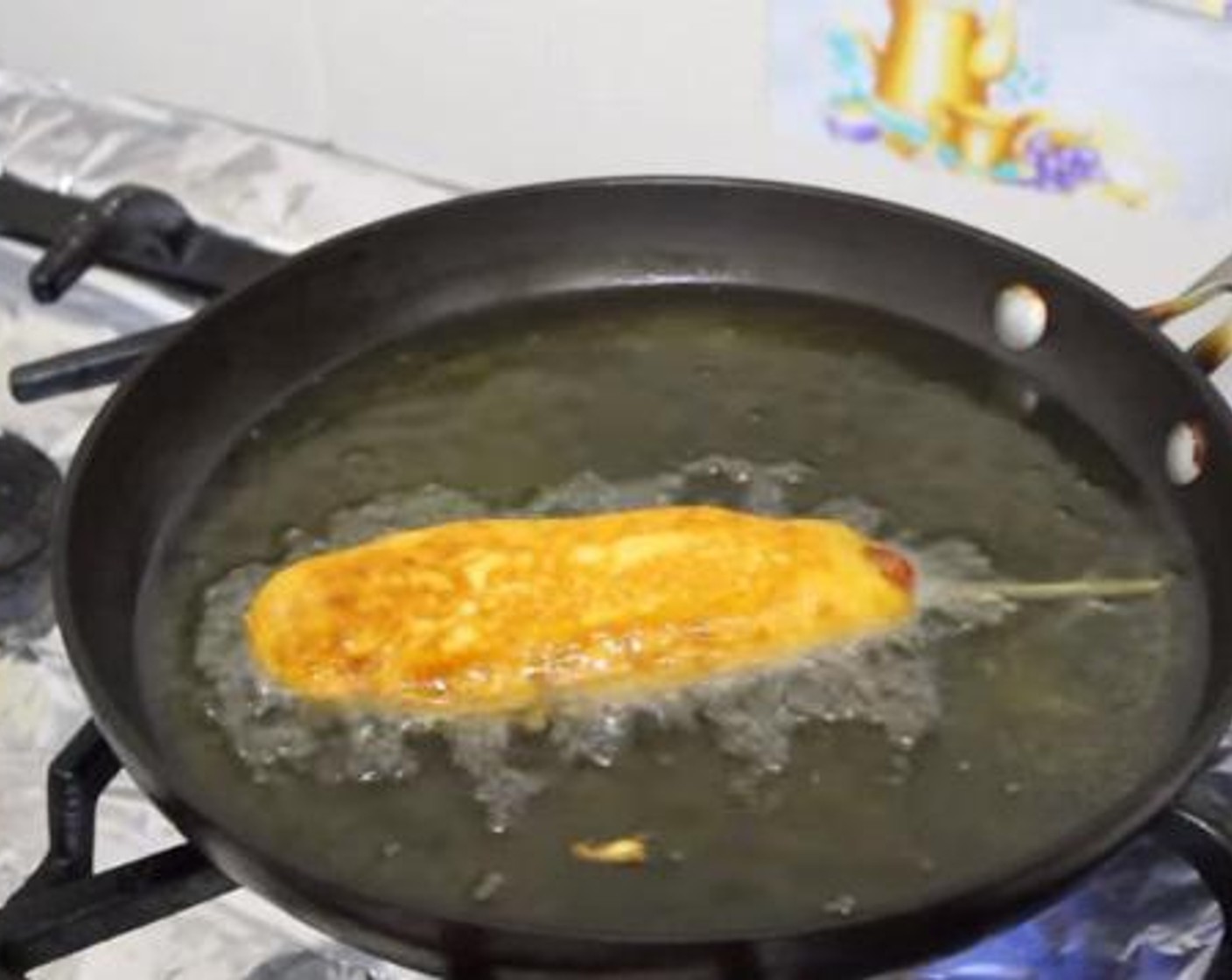 step 5 In a frying pan with some Oil (as needed), and cook each hot dog for about 3 minutes on each side.