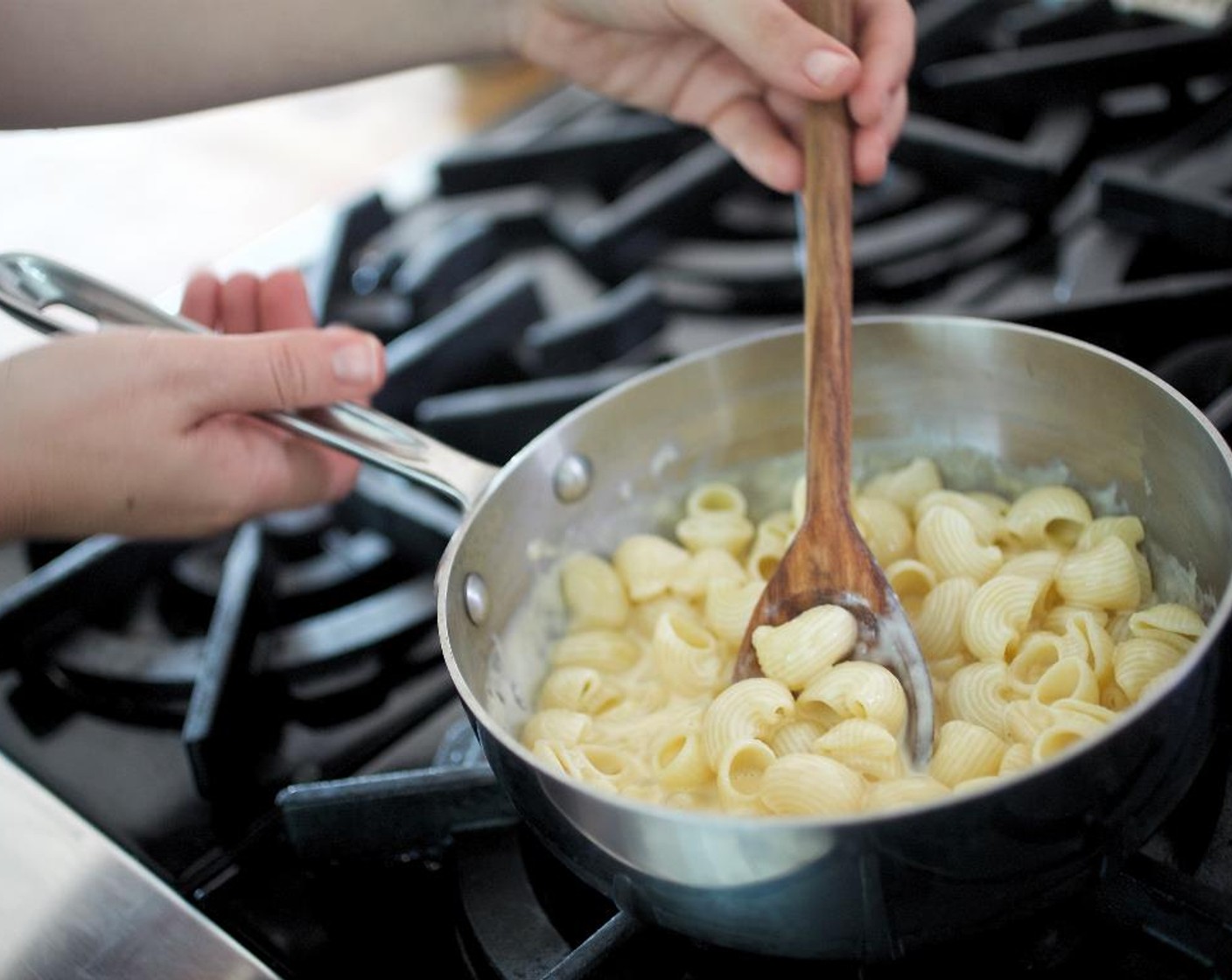step 10 Cook pasta in sauce until completely melted pasta and sauce coats pasta. Scoop the cheesy pasta into a bowl.