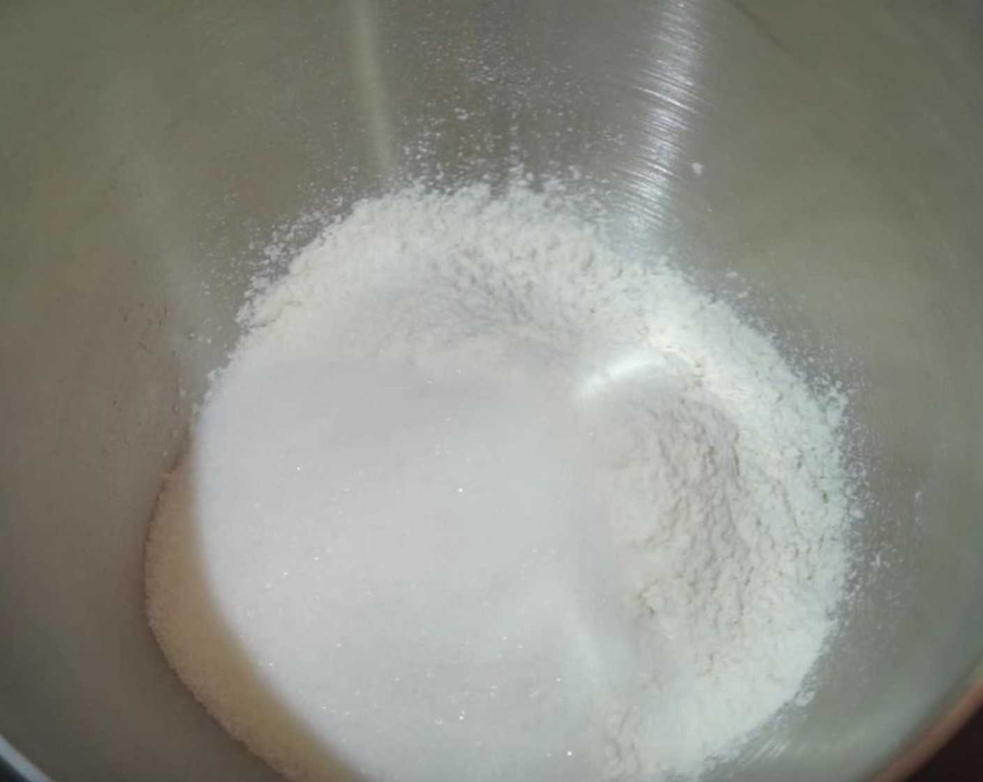 step 2 Add All-Purpose Flour (2 cups) and Granulated Sugar (1/2 cup) to a mixing bowl.