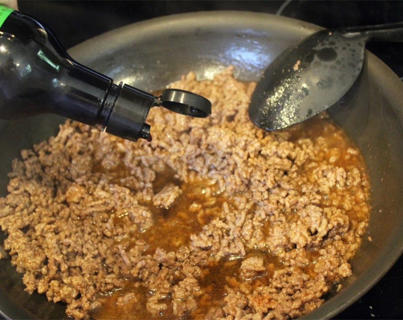 step 4 Taste the meat, and add Soy Sauce (1 tsp). Add more teaspoons as desired. Reduce the heat to medium-low, and let the meat simmer for 5 to 10 minutes until the water is partially reduced and the meat is cooked through. If it gets too dry, add a little more water.