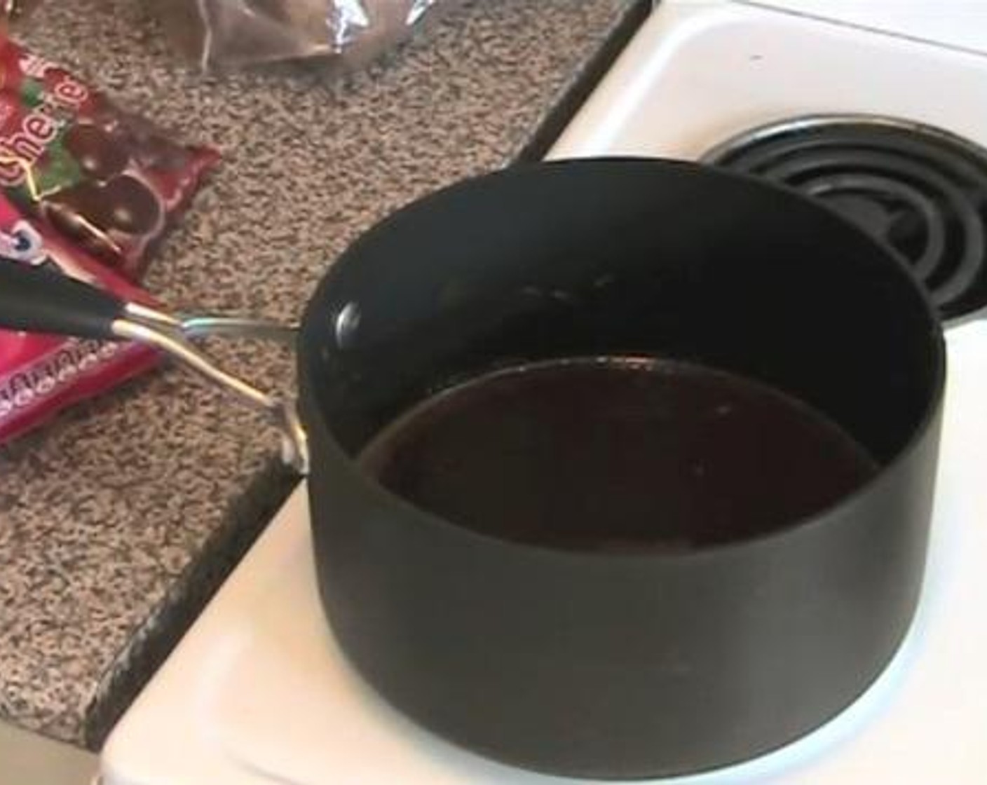 step 2 In a saucepan melt together the Chocolate Chips (2 cups) and Unsalted Butter (1/2 cup). Let the mixture cool a little bit.