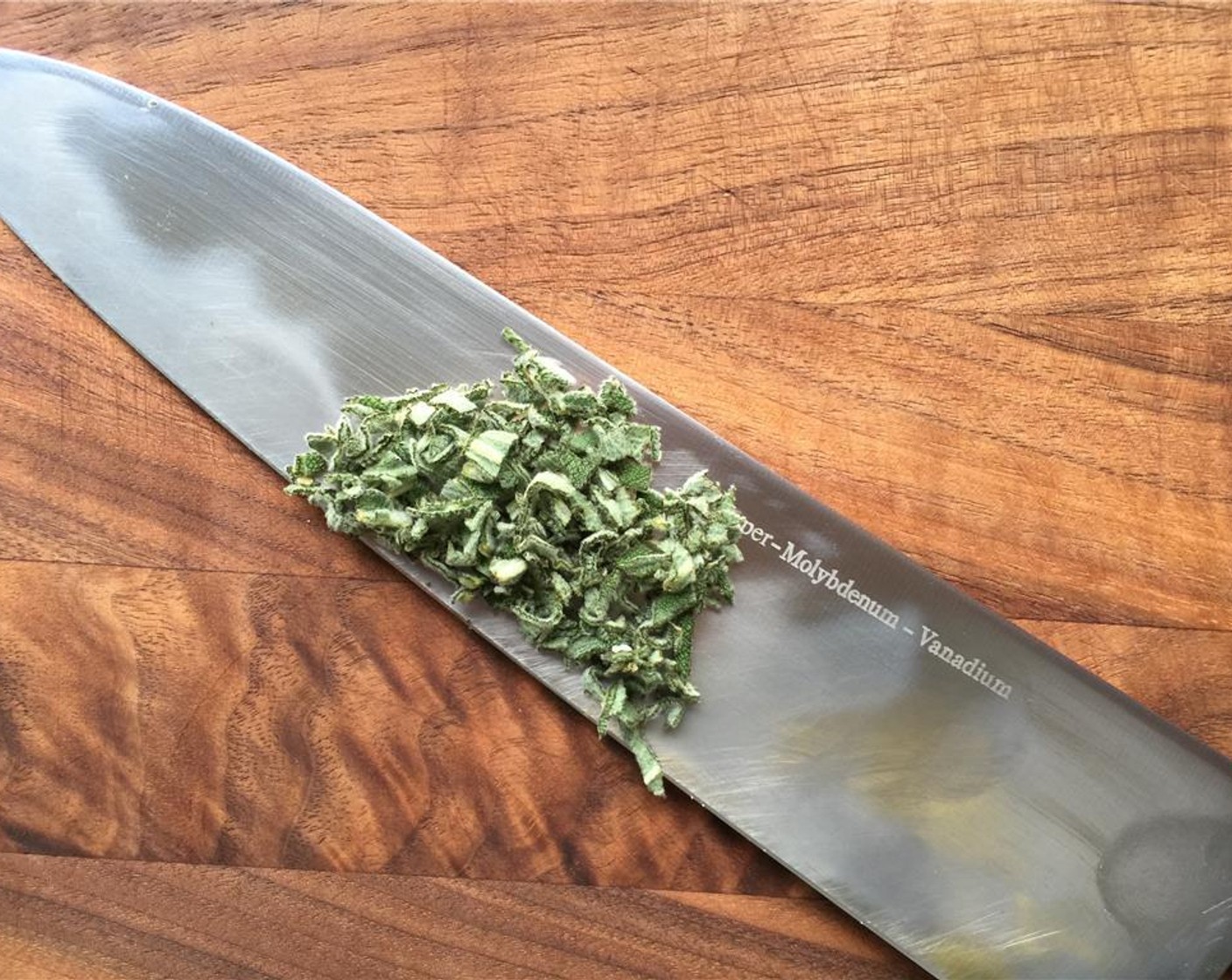 step 8 Pick off 5 to 6 leaves from the Fresh Sage (1 bunch) and finely chop. Set aside.