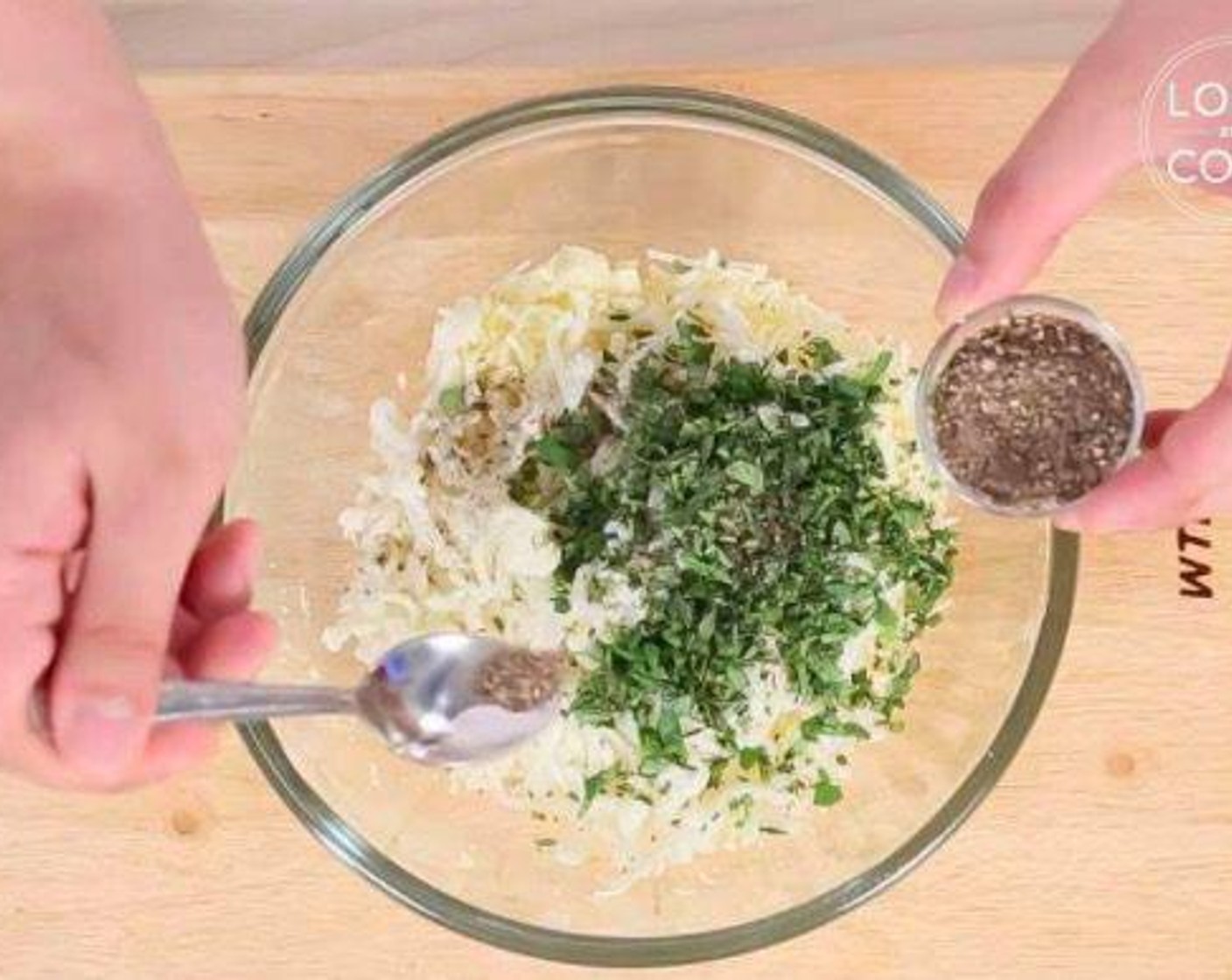 step 1 In a large bowl, take Mozzarella Cheese (1 pckg), Cheddar Cheese (1/3 cup), Fresh Basil Leaf (1 bunch), Fresh Oregano (1 bunch), then add Finely Ground Black Pepper (to taste). Mix well.