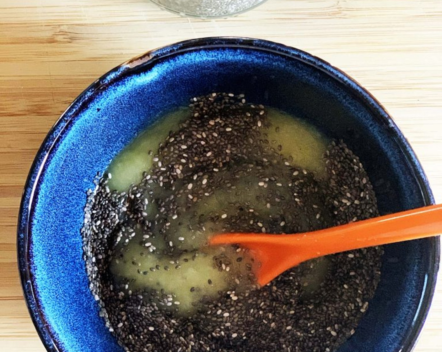 step 3 In a separate bowl stir together Apple Sauce (1/4 cup) and Chia Seeds (1 Tbsp).