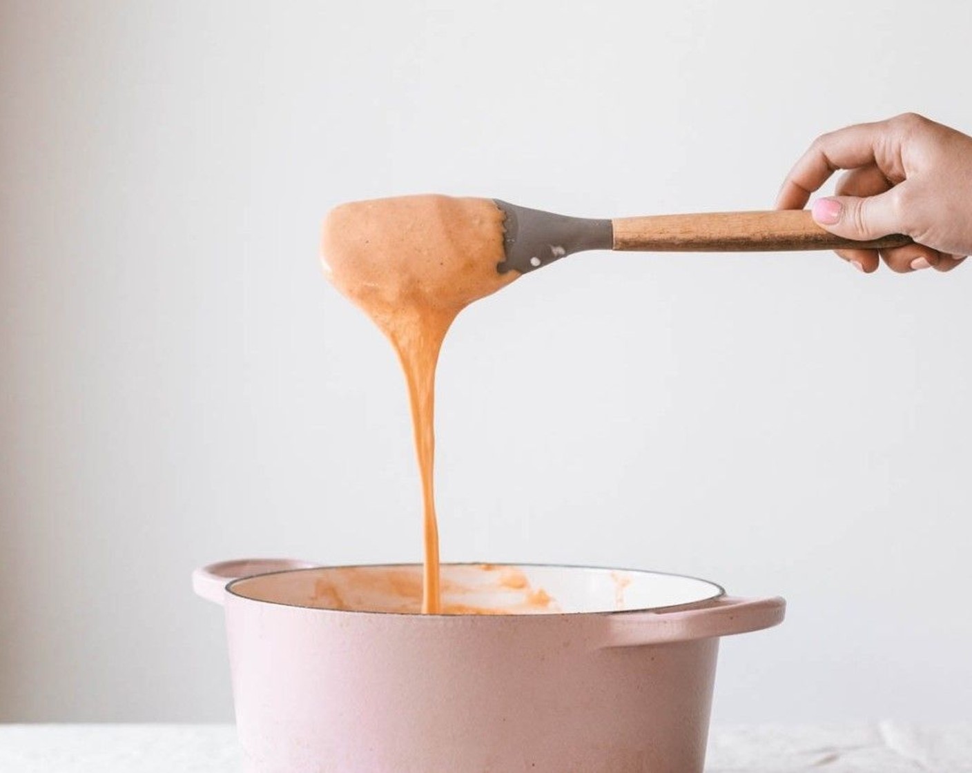 step 4 Once the sauce has thickened (about 5 minutes) mix in the Shredded Cheddar Cheese (2 cups) and Monterey Jack Cheese (1 cup) and stir until smooth. Reduce heat to low.