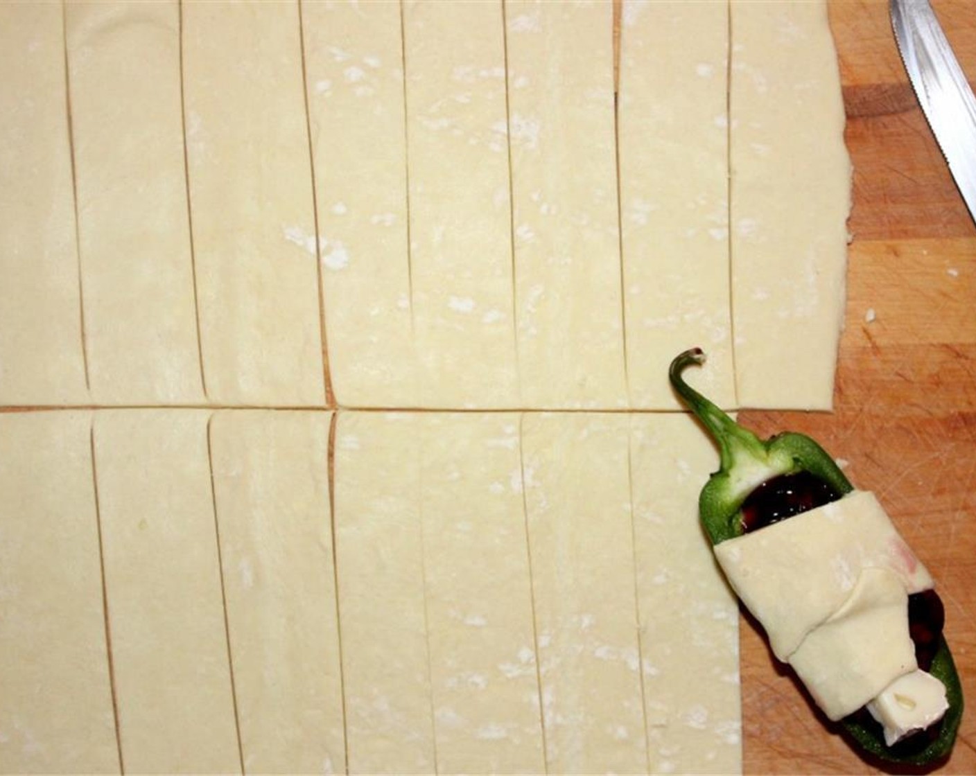 step 3 Slice the Puff Pastry (2 sheets) into approximately 30 1x3-inch strips.