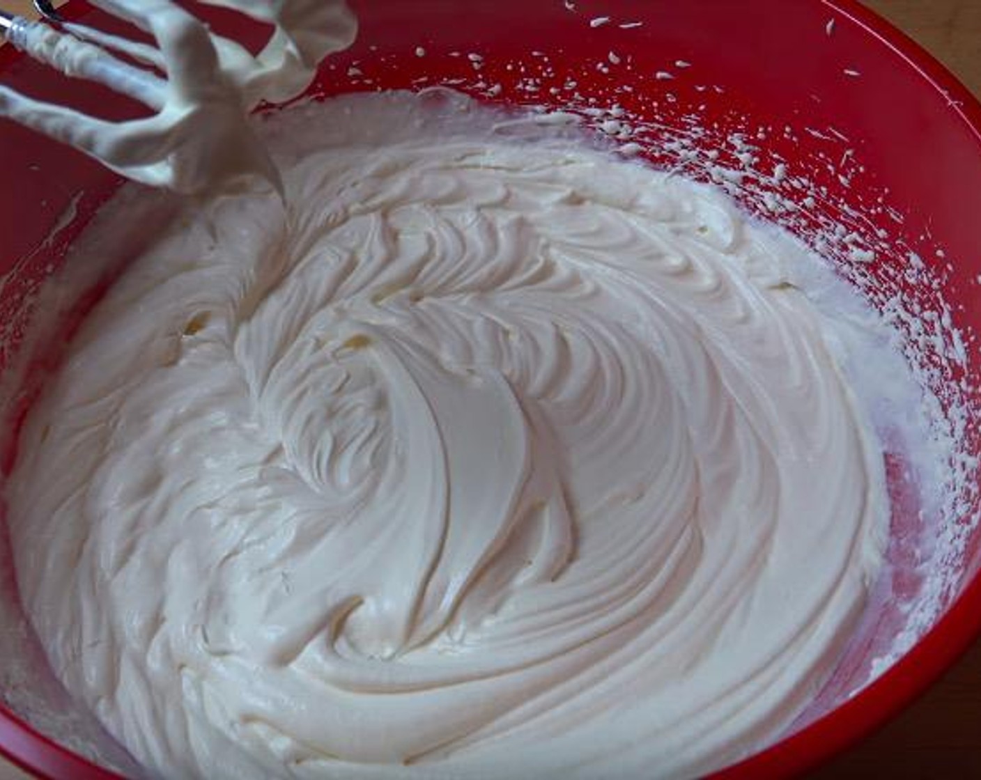 step 2 In a large mixing bowl, combine Whipping Cream (2 1/2 cups) and Sweetened Condensed Milk (2/3 cup). Beat together until the mixture forms soft peaks.