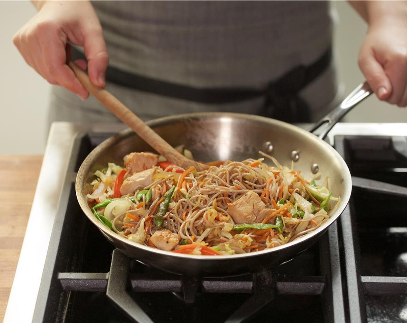 step 14 Add the soba noodles, chicken mixture and remaining Tamari Soy Sauce (1 Tbsp). Remove from heat and set aside for plating.