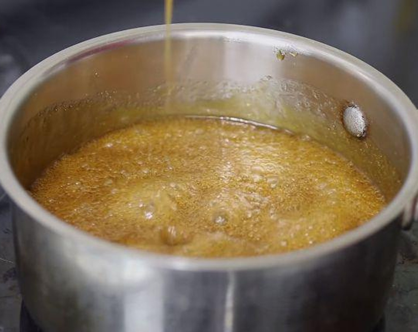 step 5 Make caramel sauce by combining Brown Sugar (1 cup),Butter (1/2 cup), Heavy Cream (4 Tbsp), and Salt (1 pinch) in a sauce pan over medium heat. Cook stirring frequently until the butter is melted and sugar is dissolved. Pour the caramel in a 9x13 inch pan. Sprinkle Chopped Pecans (to taste).