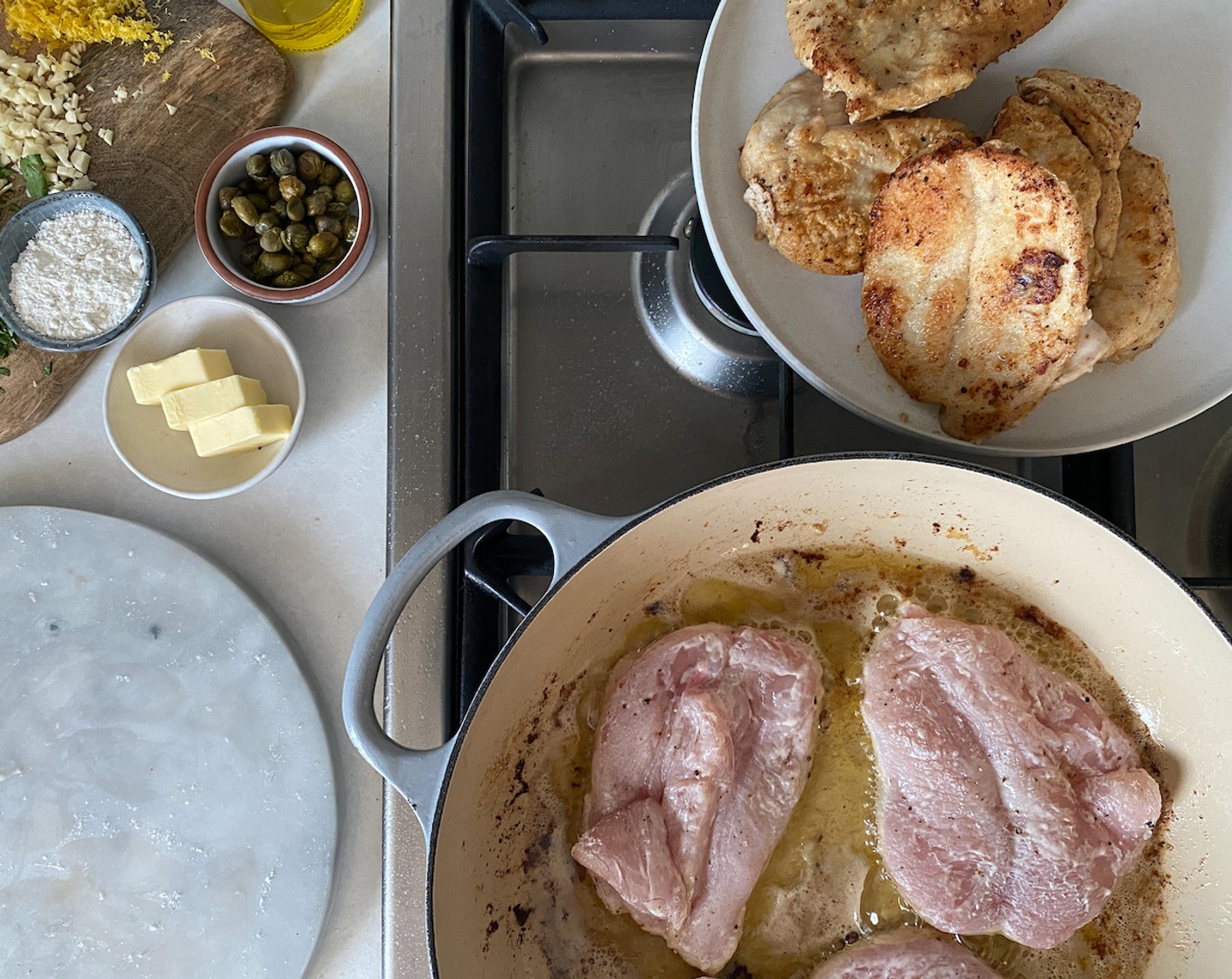 step 5 When the butter is sizzling, add the chicken and brown in batches until the outside is golden. Remove and set aside (chicken will still be raw in the center).