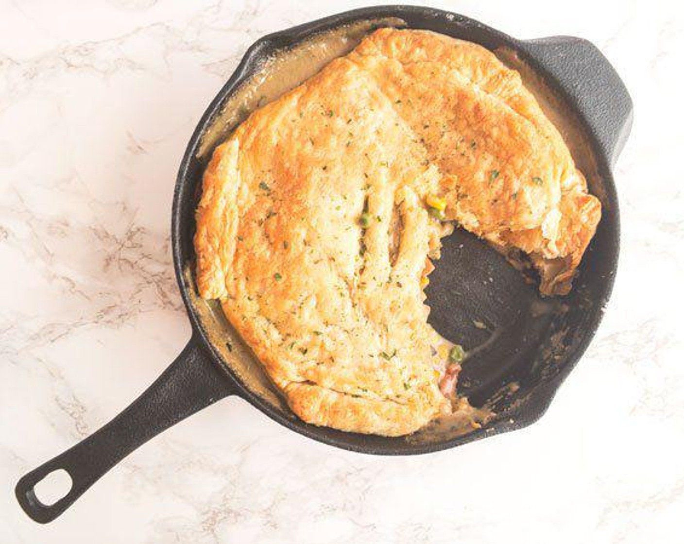 step 6 Bake for 22-25 minutes, or until golden. If your pot pie pan is full to the very top, place it on a baking sheet while baking to avoid a bubbling-over mess that could be hazardous!