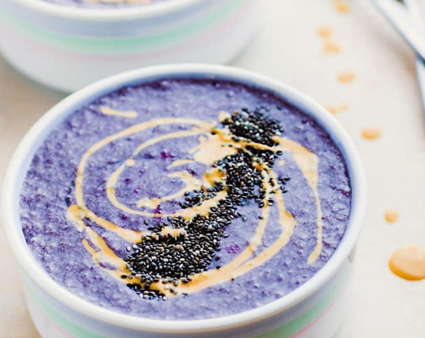 step 3 Pour into bowls and add a drizzle of peanut butter, chia seeds, and more honey, if desired. Serve and enjoy!