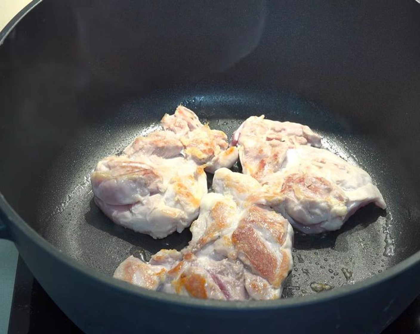 step 1 In a large pot over medium heat, add Boneless, Skinless Chicken Thighs (8) in batches. Cook for about 2 minutes on each side, or until lightly browned. You don't need to cook it all the way through. Set aside.