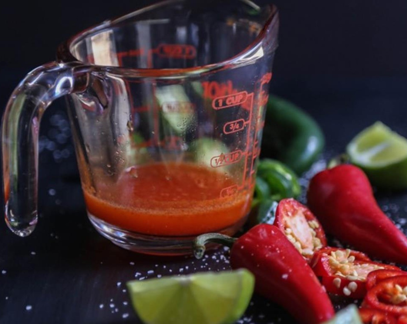 step 2 In a large pitcher, combine kimchi juice, juice from Lime (1), Tomato Juice (1/2 cup), Serrano Chili (1), and Jalapeño Pepper (1/2). Place the pitcher in the fridge and let the flavor combines for at least 30 minutes.