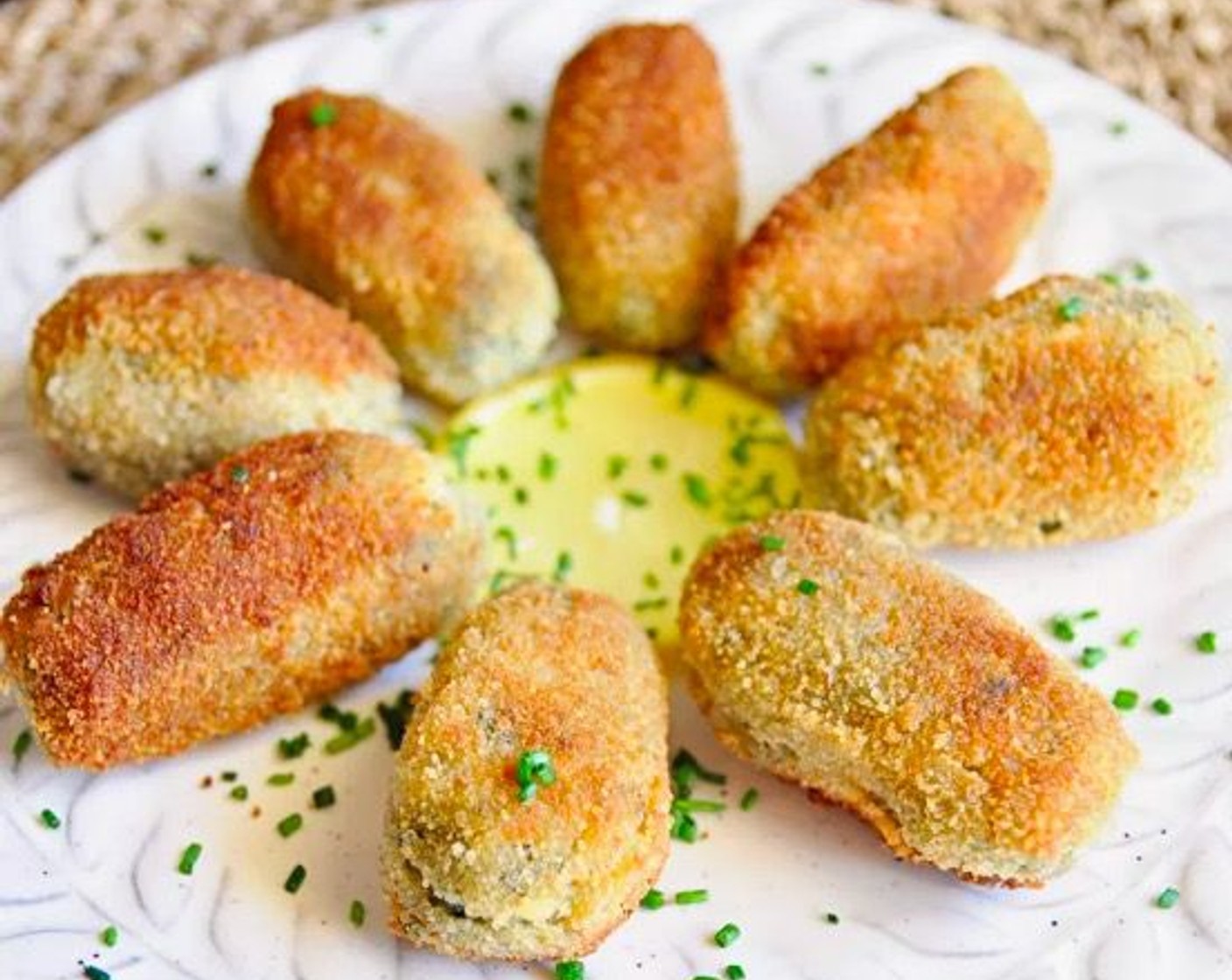 step 13 Arrange croquettes around Lemons (to taste) and sprinkle dish with Fresh Chives (to taste). Serve immediately and enjoy!
