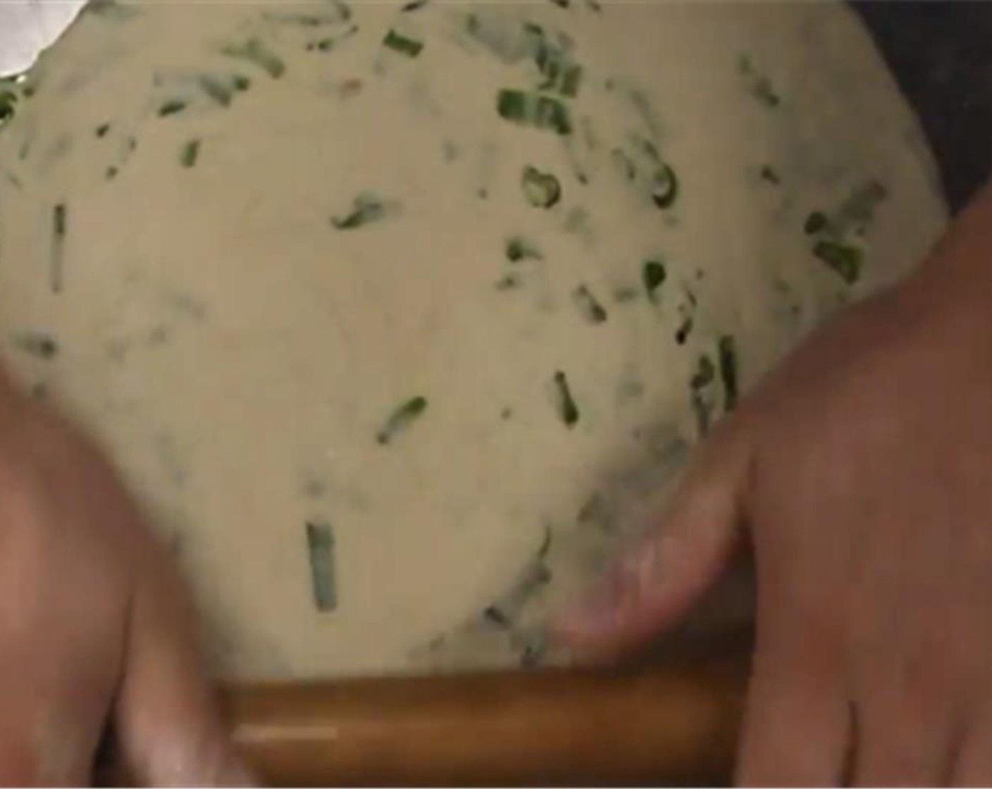 step 13 Roll the dough out thicker this time, into a circle shape about the width of two hands across.
