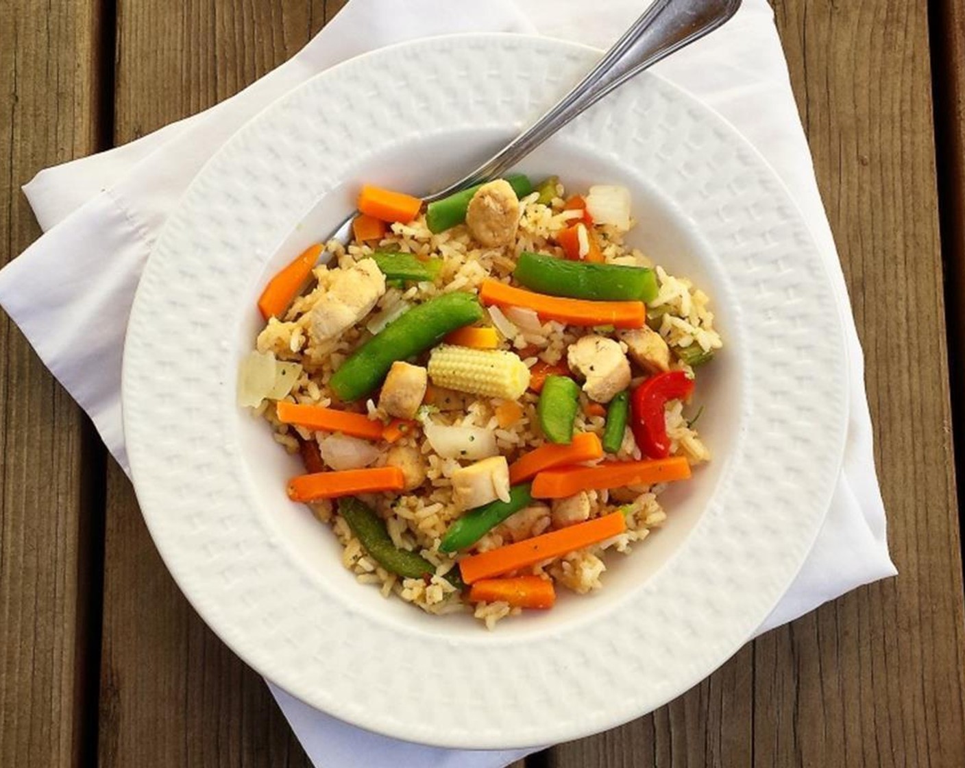 step 3 In a small container, beat the Eggland's Best Classic Egg (1) then add to rice, vegetables and chicken. Mix thoroughly and allow to cook. Remove from heat and add Soy Sauce (to taste). Serve warm and enjoy!