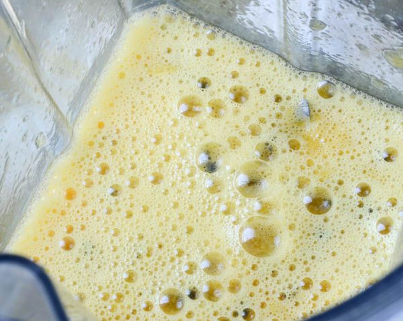 step 12 Scoop the pulp into a blender. On low speed, pulse the blender to separate the seeds from their gelatinous membrane, but not enough to puree the seeds.