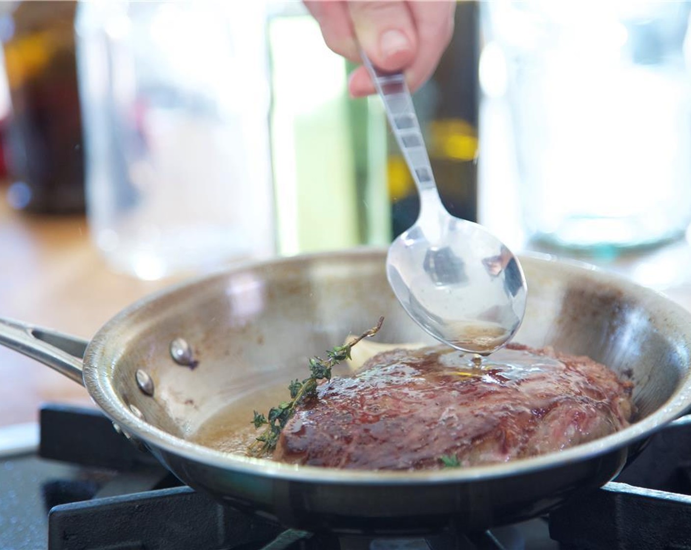 step 8 Pat dry the Rib Eye Steak (1) with paper towels. Place the medium cast iron skillet or heavy saute pan over high heat. Coat the steak with 1 teaspoon of olive oil. Season both sides of the steaks with 1/4 teaspoon salt and 1/4 teaspoon pepper.