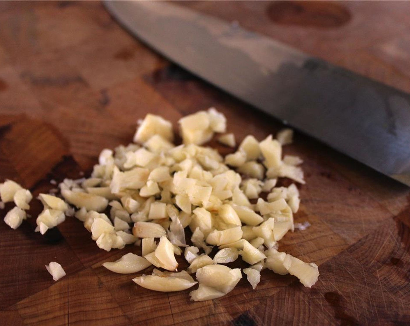 step 2 Peel and mince the Garlic (2 cloves).