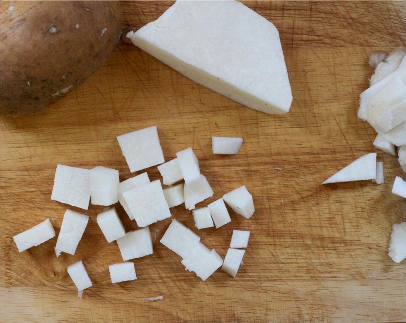 step 2 Dice the Jicama (1/2) into slightly smaller cubes, and slice up the Fresh Strawberries (12).  Chop the Fresh Basil Leaves (2 Tbsp) and Fresh Mint Leaves (2 Tbsp).