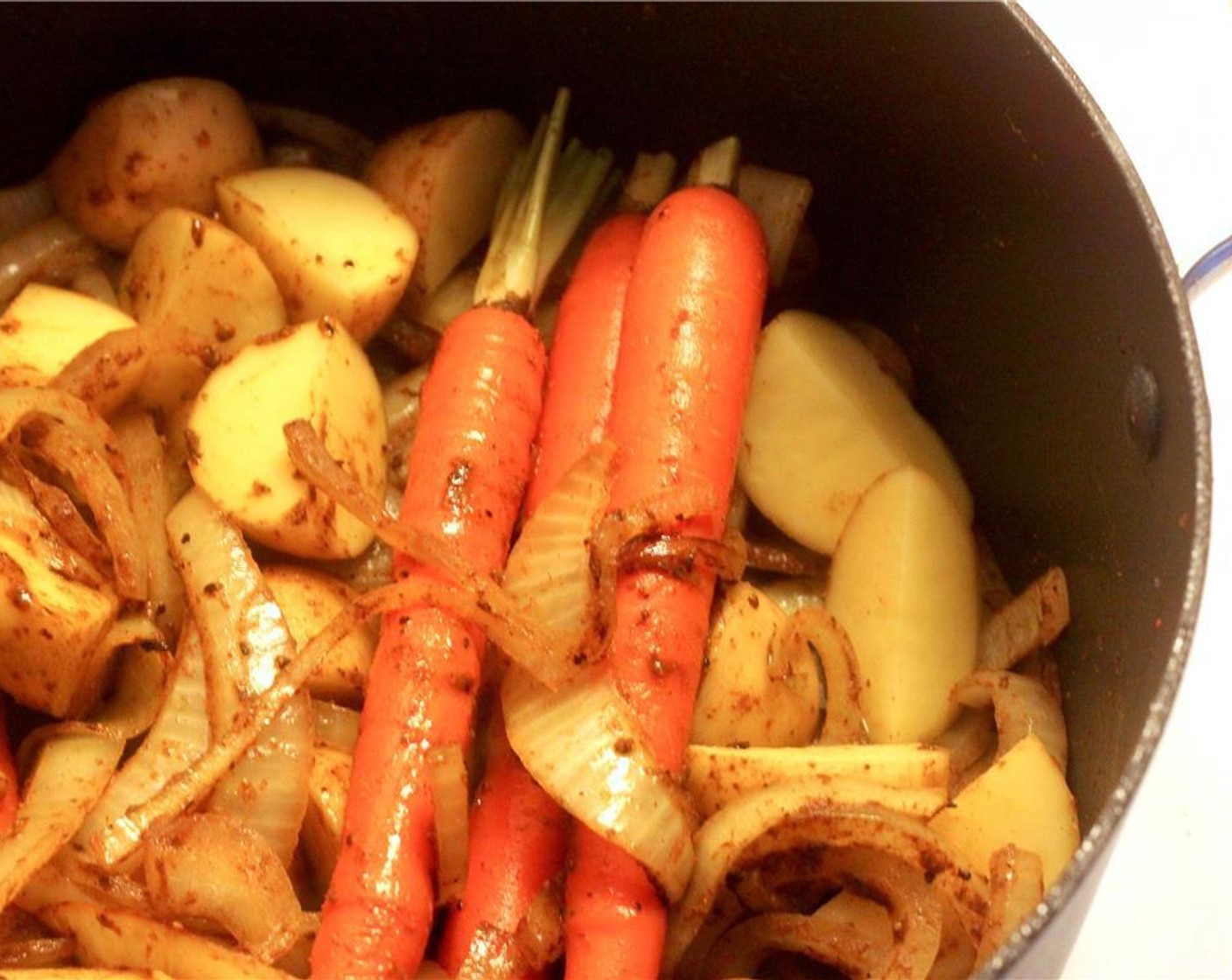 step 7 Add potatoes and Carrots (5) and continue to cook the vegetables for another 10-15 minutes, until deep brown.