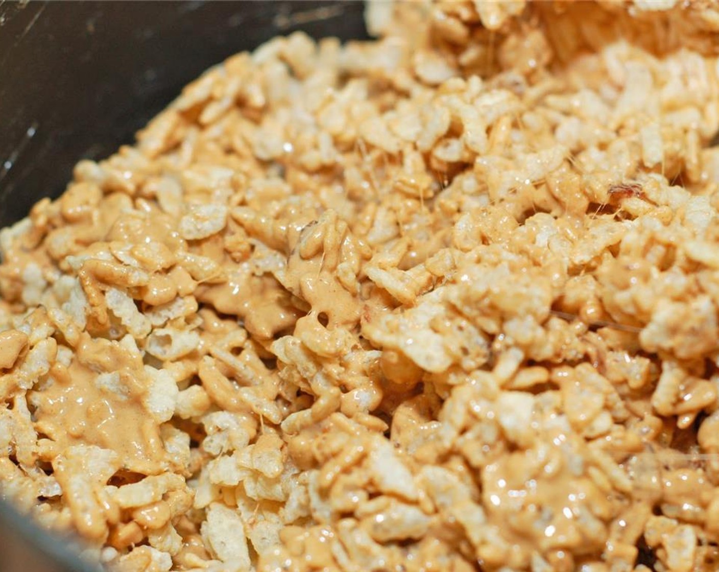 step 4 Then add the Rice Krispies® Cereal (6 cups). Mix until all is well incorporated.