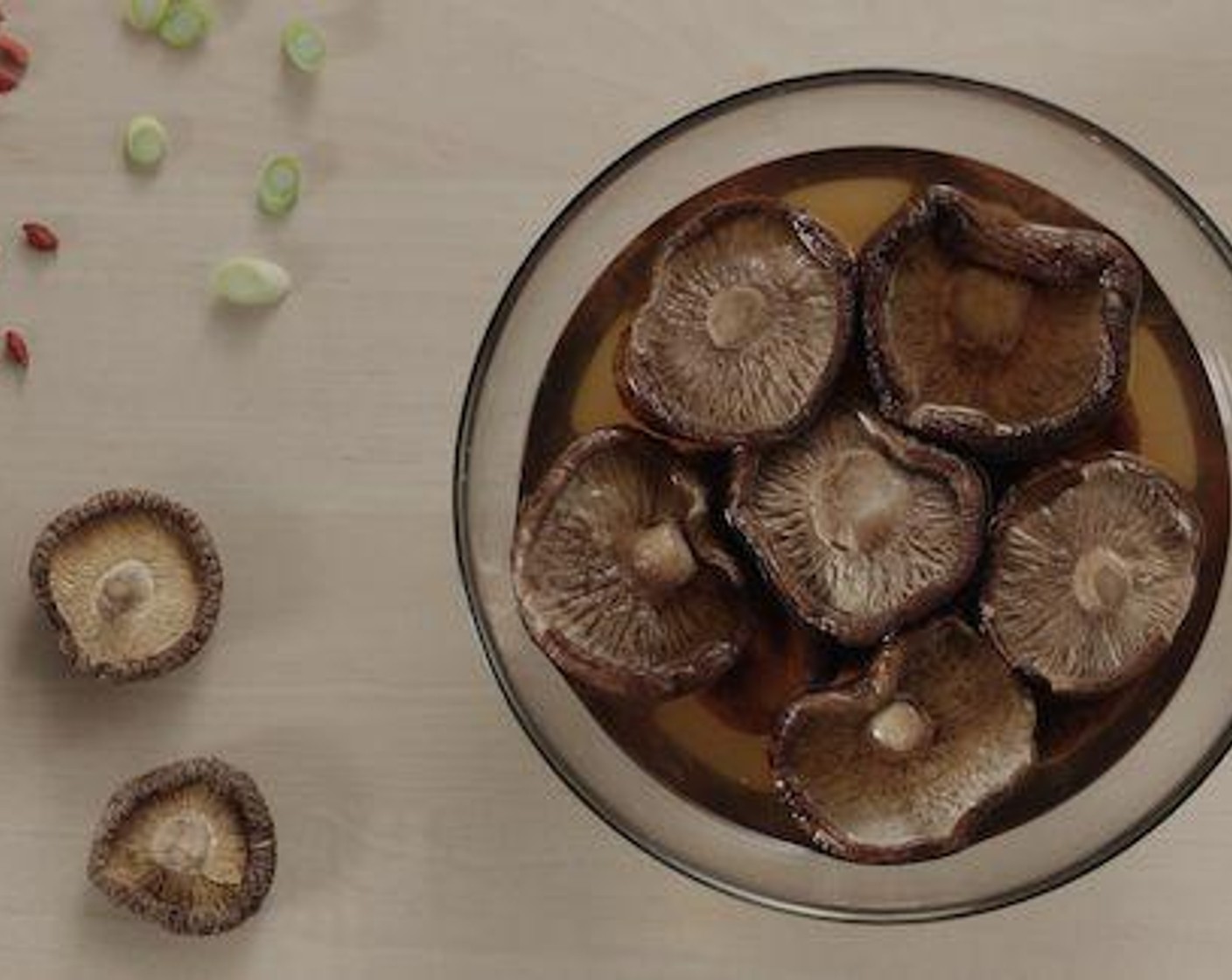 step 1 Soak the Dried Shiitake Mushrooms (2 tsp) in room temperature water to extract a richer flavor.