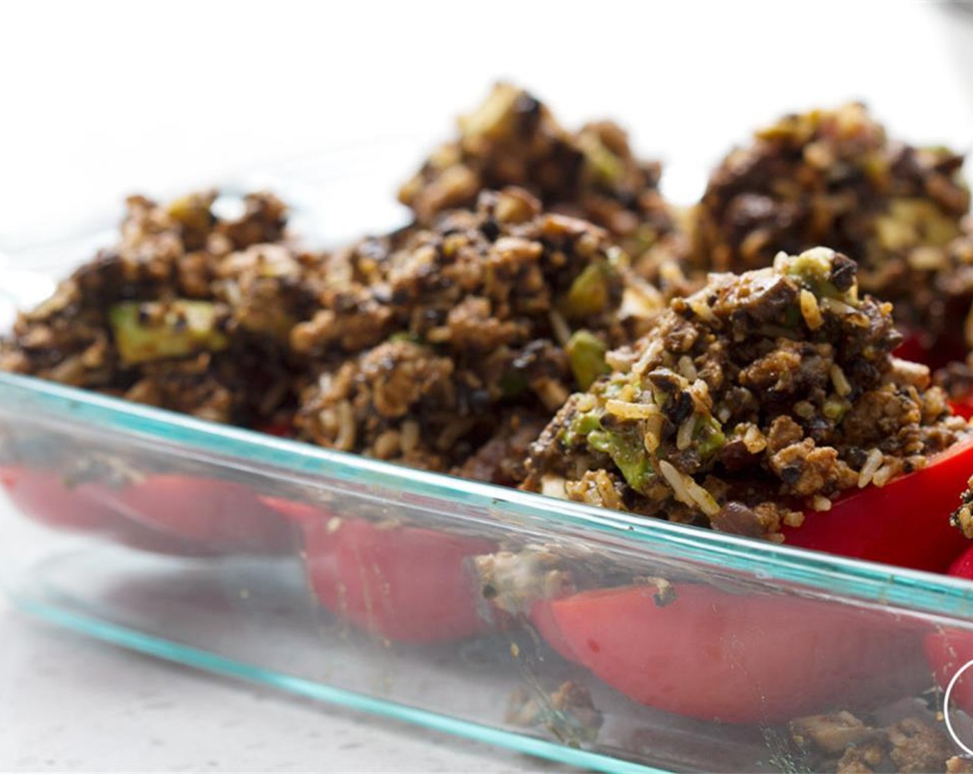 step 7 Stir well to combine, then add Kosher Salt (1/2 tsp) and Ground Black Pepper (1/4 tsp). Arrange the bell pepper halves, cut side up, in a baking dish, and spoon the filling into each pepper. Bake 30 minutes, or until tender and browned.