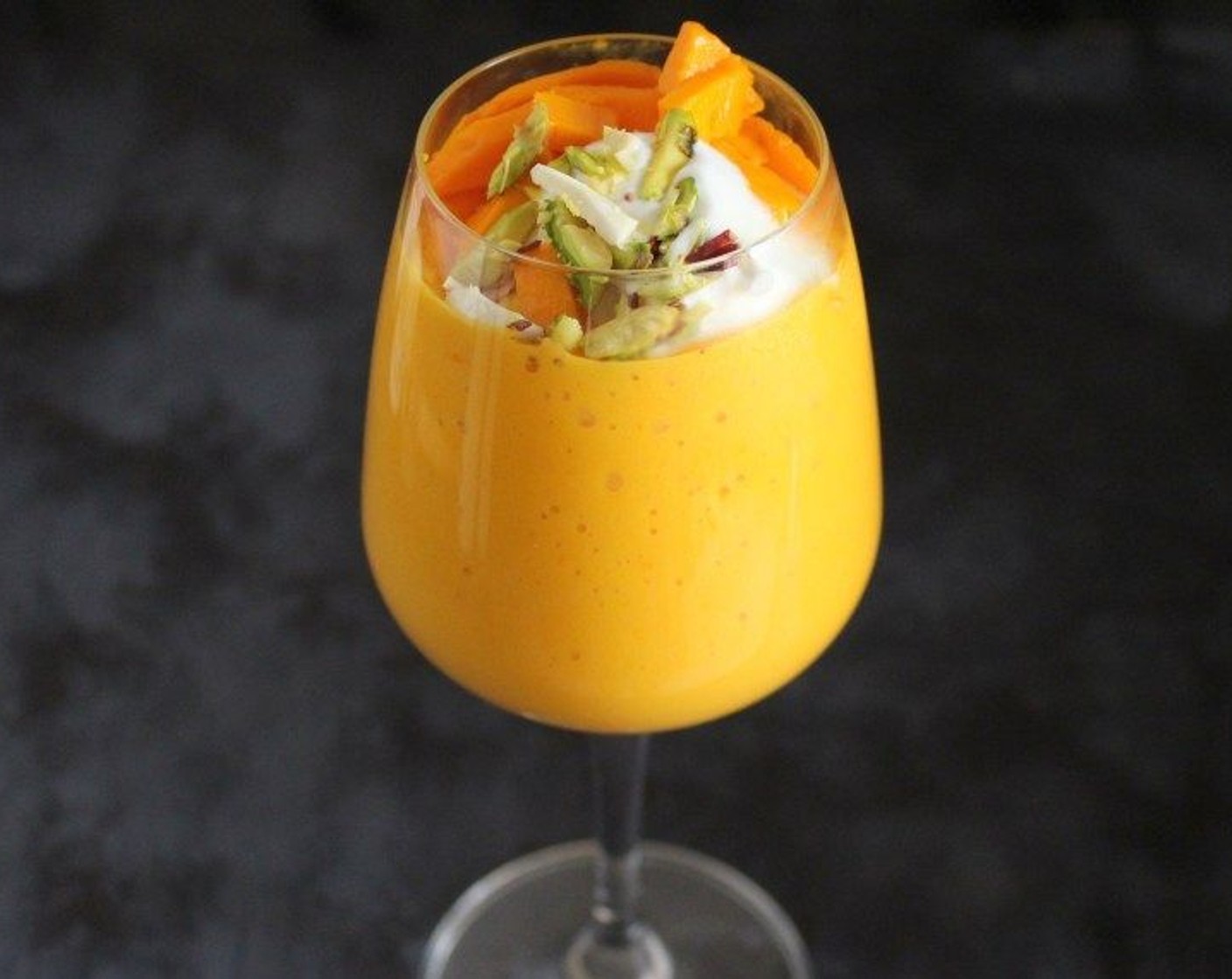 step 3 Pour it in a glass and garnish it with vanilla or mango ice cream, or some chopped fruit. Serve chilled. Enjoy!
