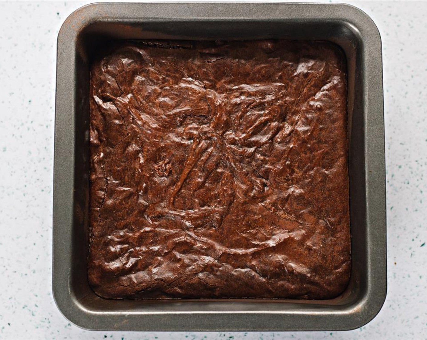 step 12 Place brownies in the oven and bake for 40 minutes, or until just set.