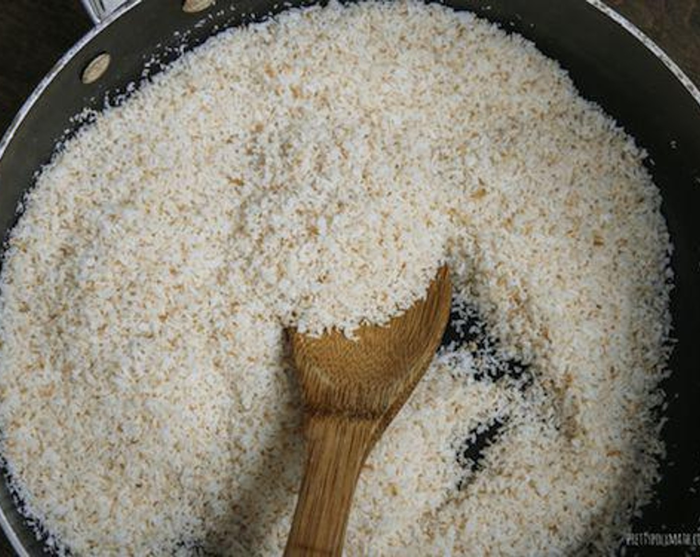 step 1 In a large non-stick pan over low heat, toast Unsweetened Shredded Coconut (2 cups) until it turns golden brown.