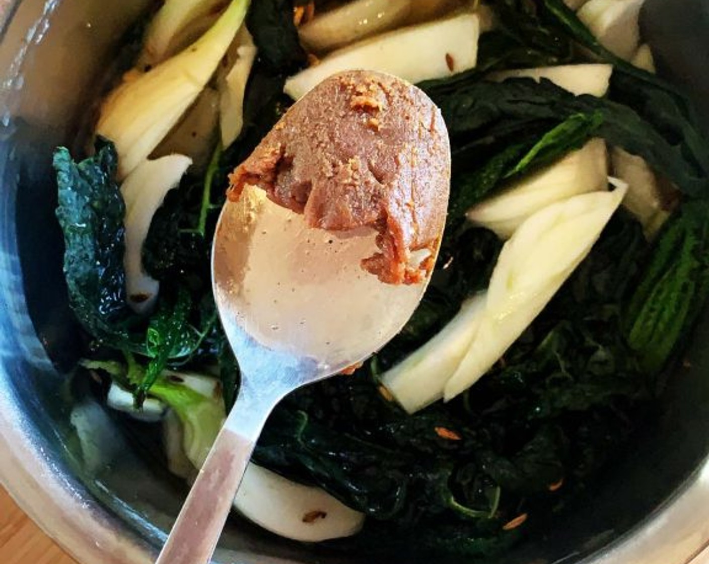 step 3 Next, add the sliced fennel and Tuscan kale, pour in enough Water (as needed) to cover completely, and add the Miso Paste (1 Tbsp). Cover with a lid and let simmer until the fennel is tender.