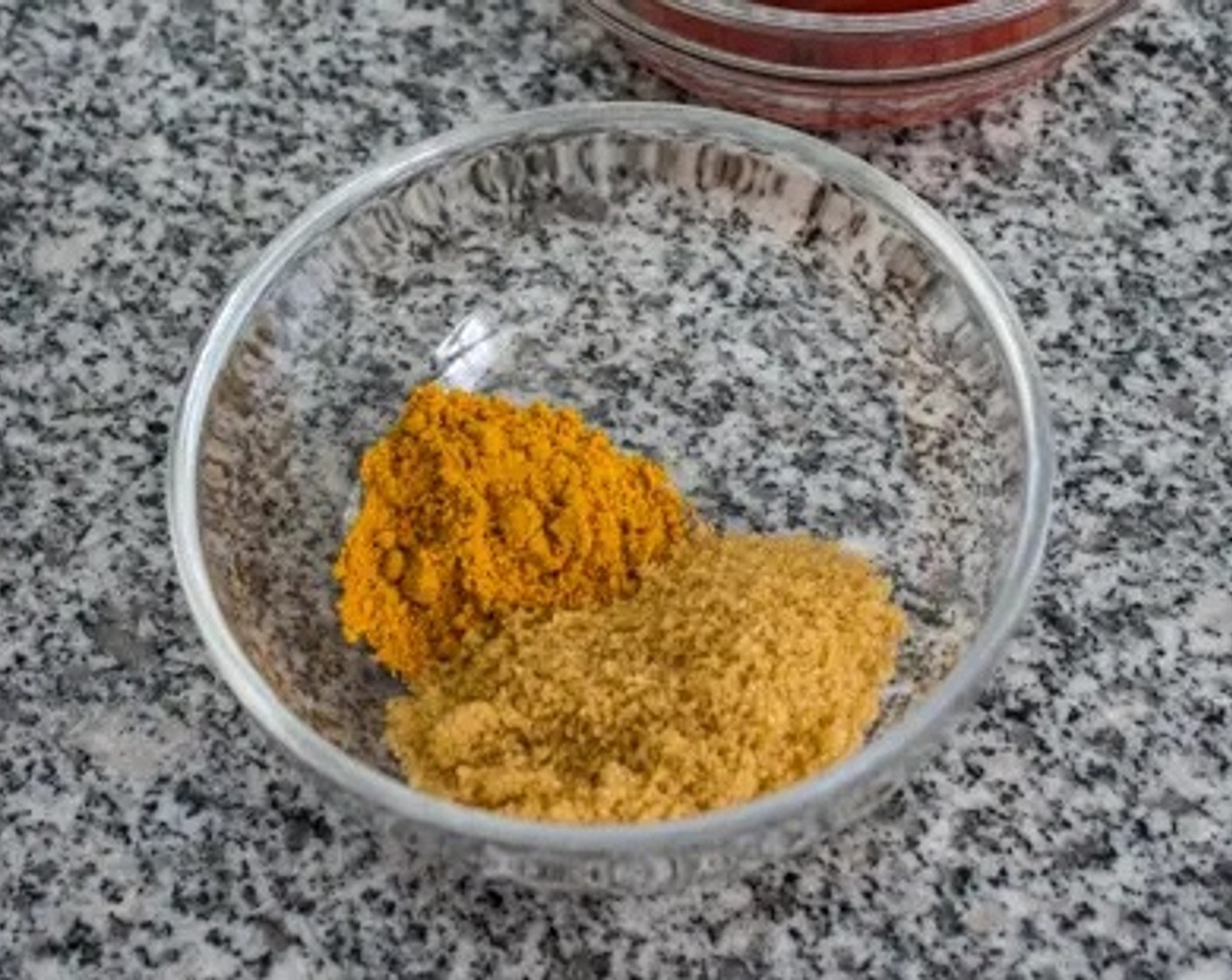 step 3 In a separate small bowl, mix Curry Powder (1 1/2 Tbsp) with Brown Sugar (1 Tbsp).