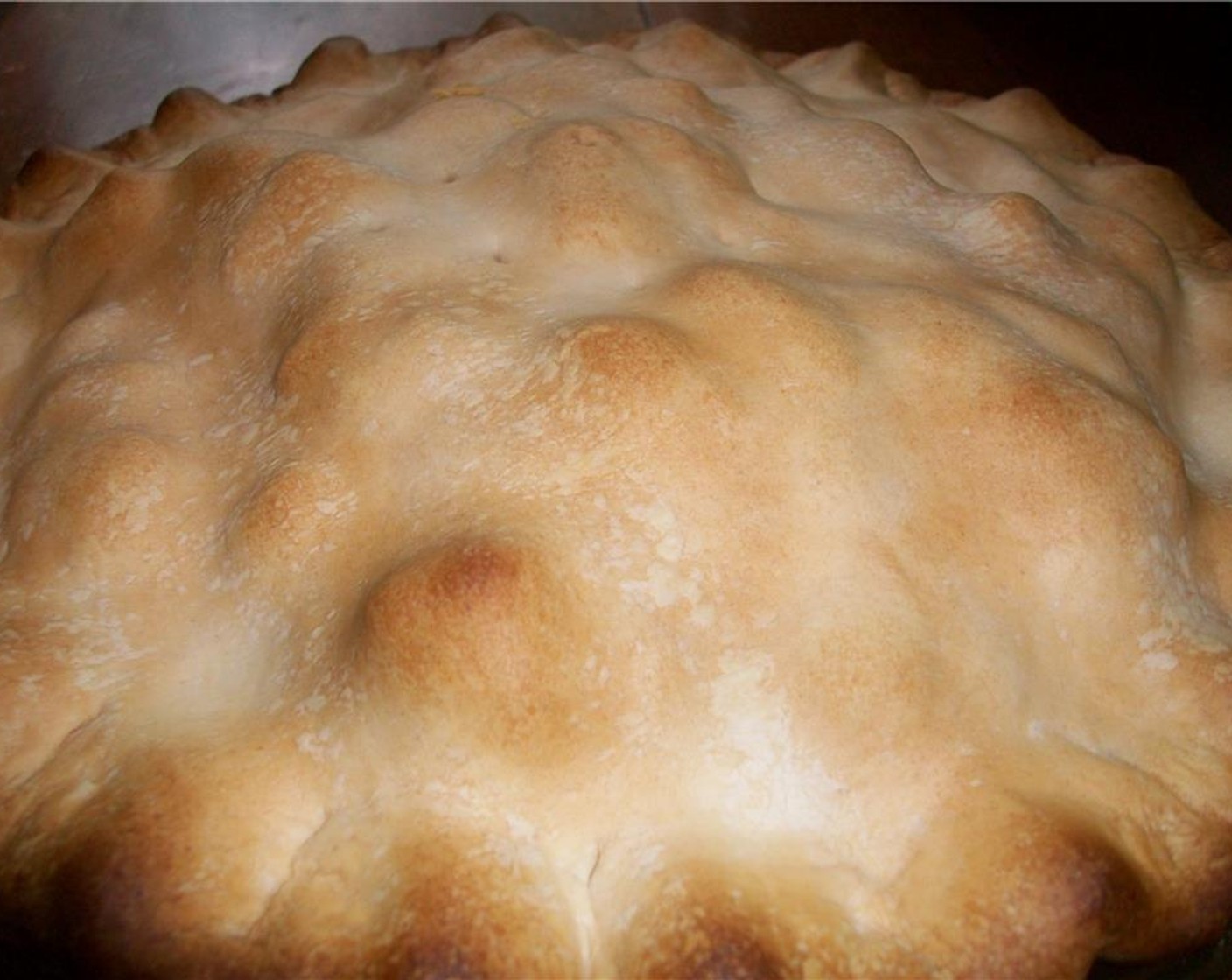 step 14 Cover with the remaining pie crust. Flute the edges and pierce the top to let the steam escape. Bake for 50-60 minutes until it becomes golden brown.